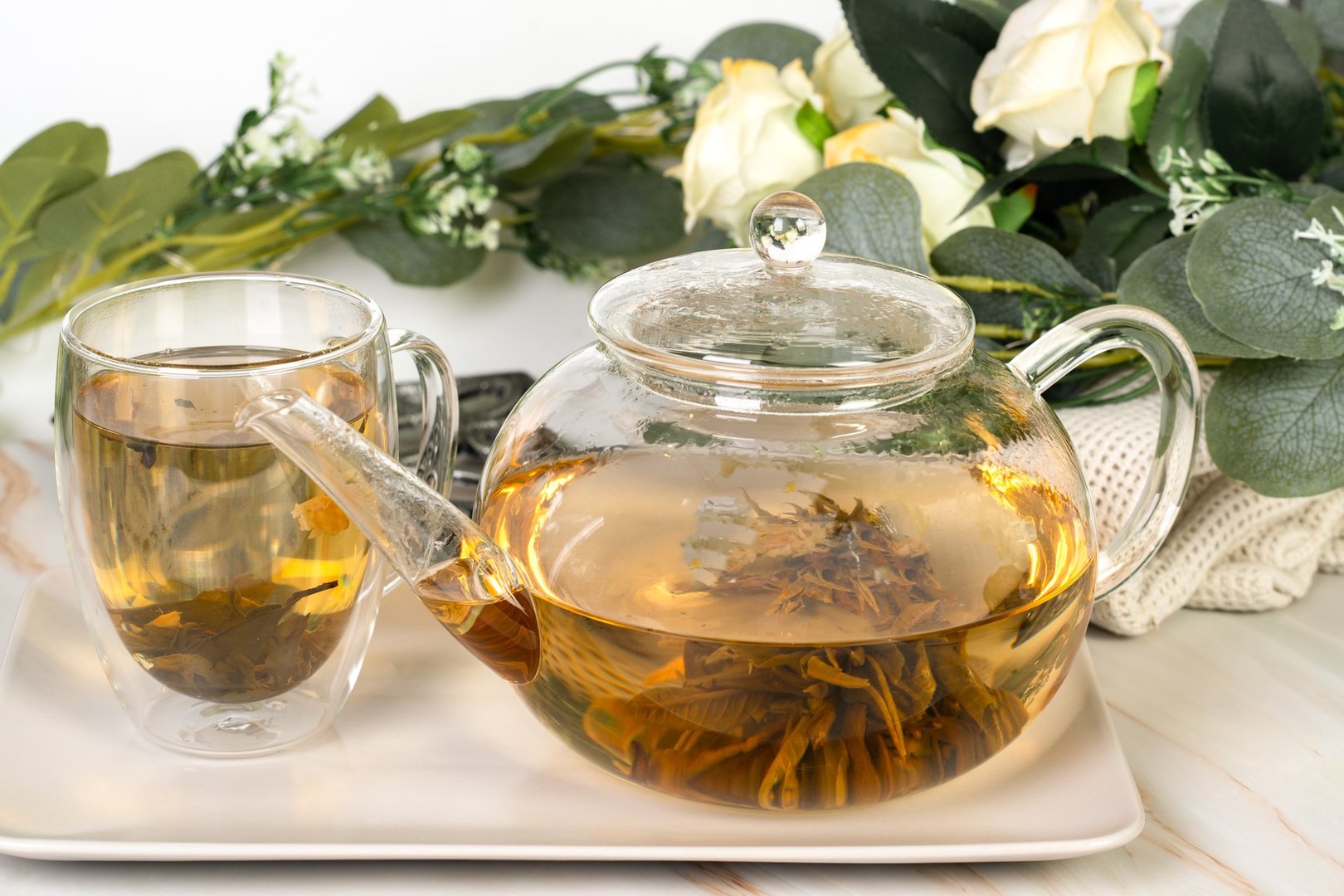 White Tea in Transparent Glass Teapot
