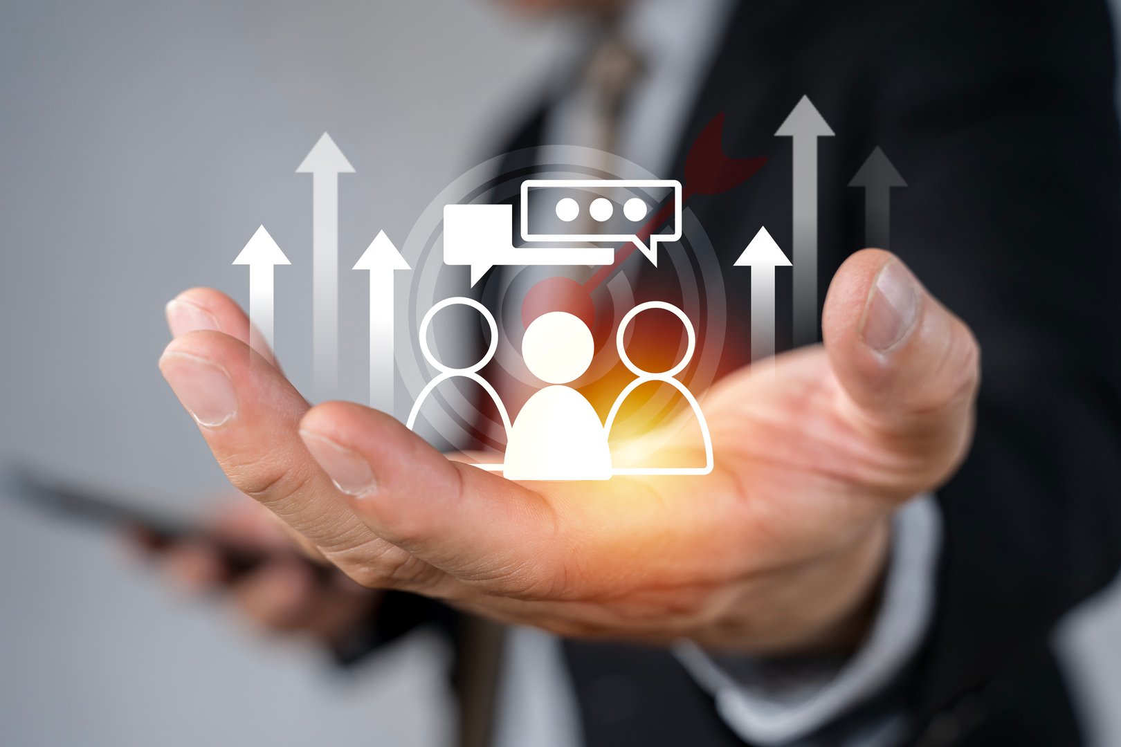 Businessman holding virtual target customer icon for customer focus group and Targeting customer concept. Digital marketing online, CRM, Data exchanges development and customer service.