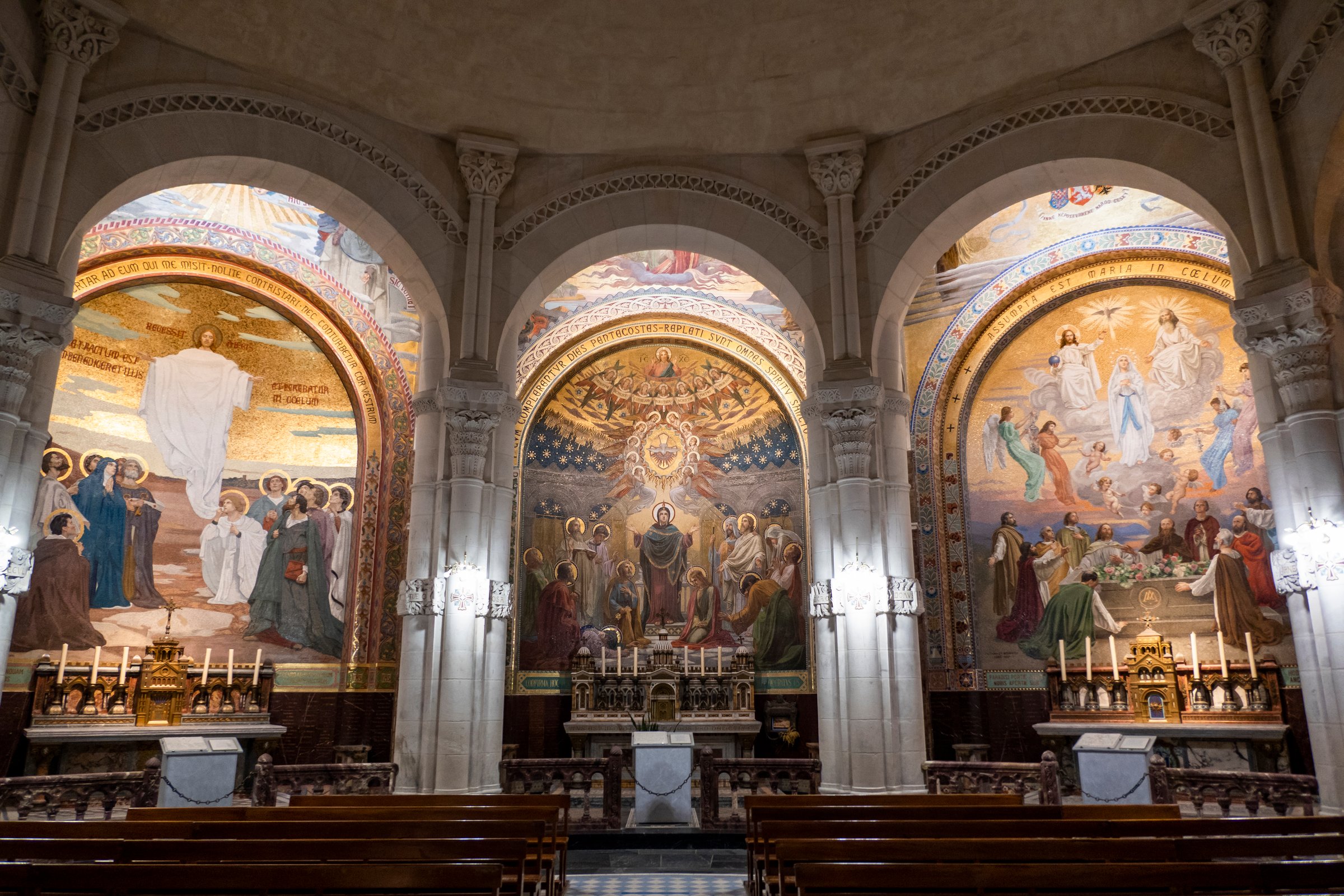 Interior and altar of the Parish Church in Lourdes, France