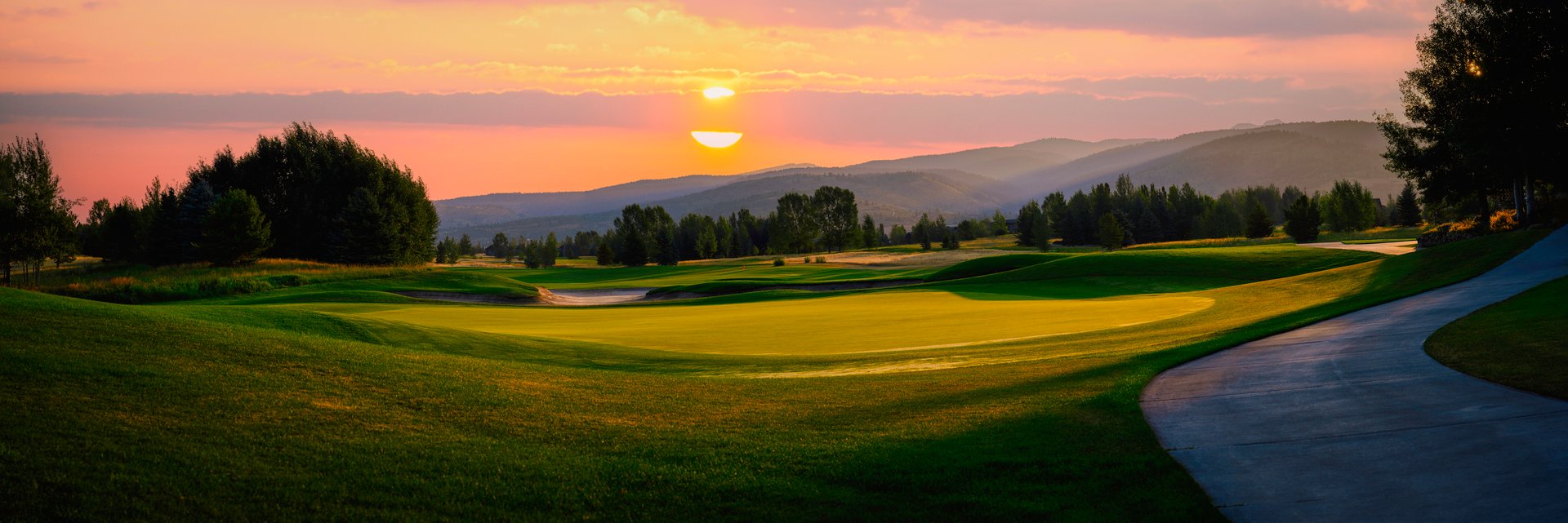 Sunrise over golf course in Teton