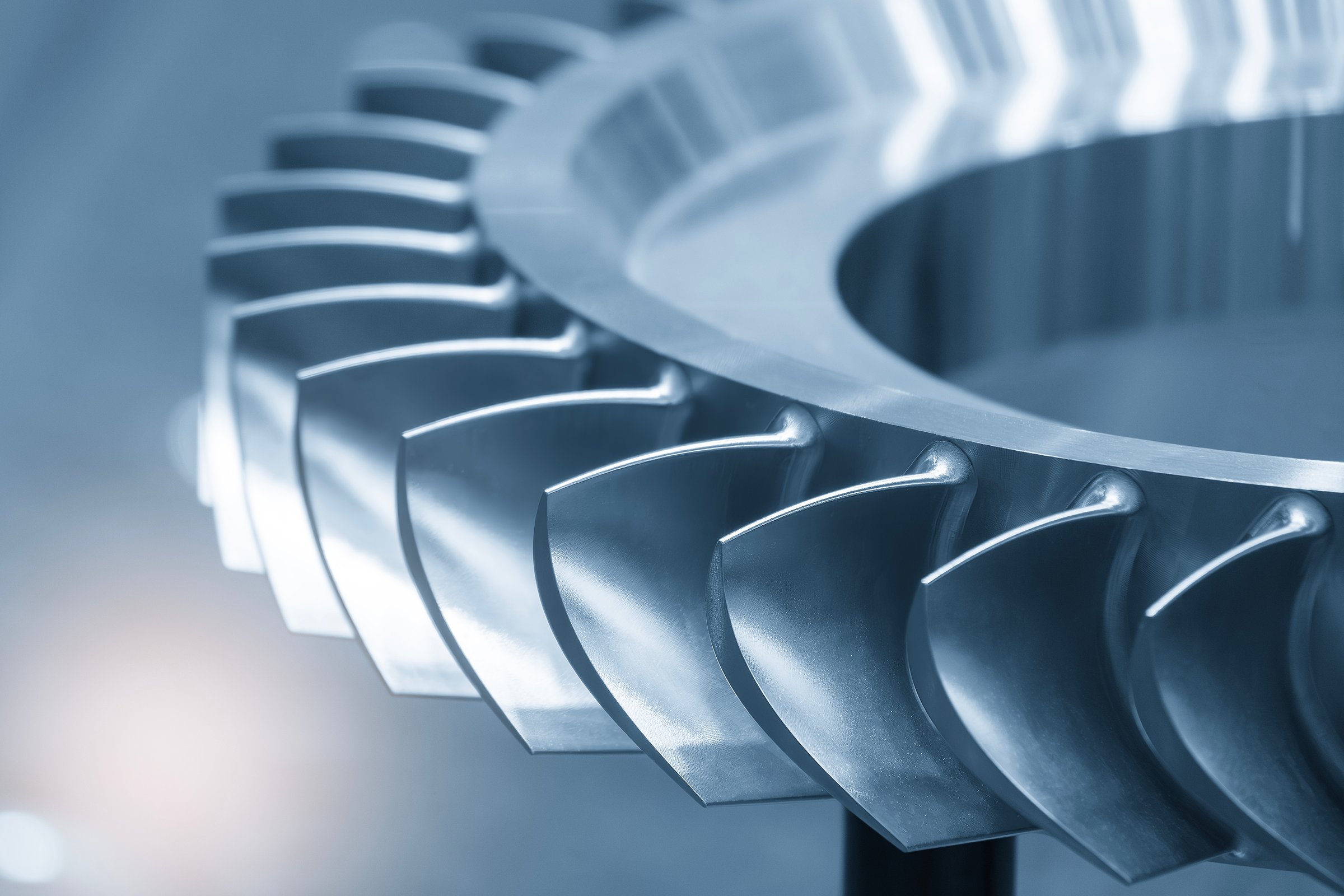 Close up scene the jet engine parts in the light blue scene. The high precision aero parts manufacturing process.