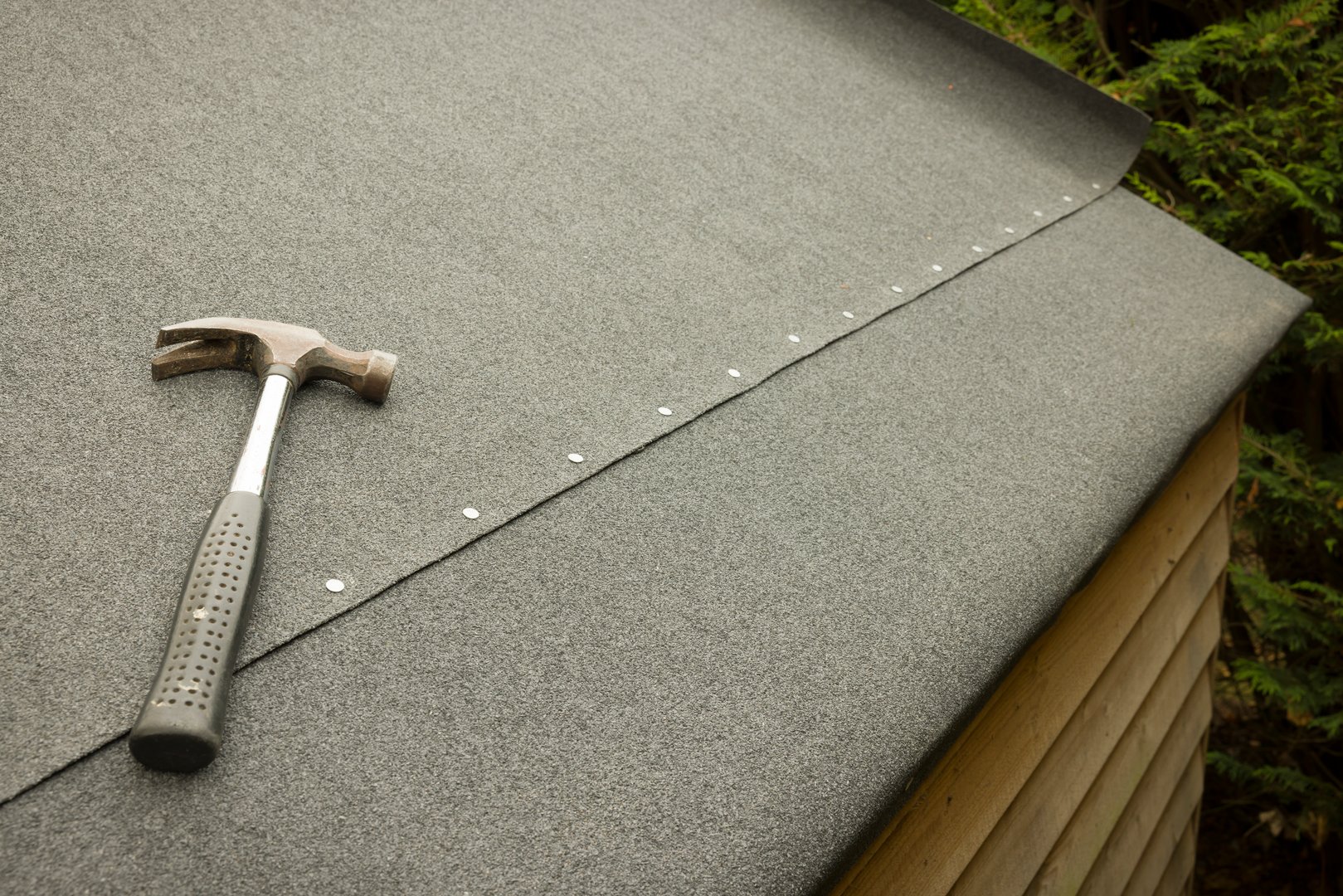 Replacing felt on a shed roof