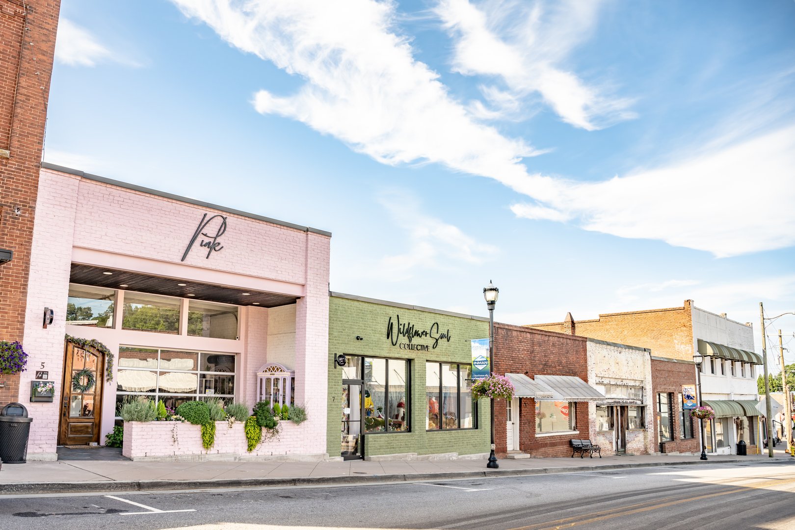 Inman, SC - August 7, 2022: Beautiful, rustic store fronts in downtown Inman, along famous Mill Street