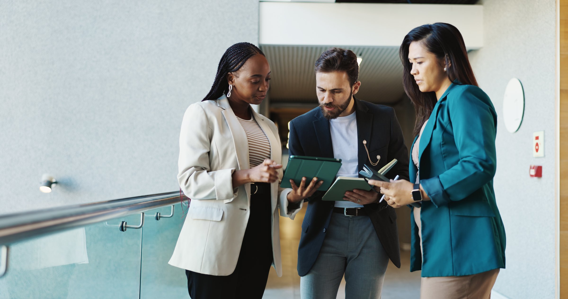 People, tablet and meeting in lobby for business, planning agenda and campaign feedback with notes. Politician, legal team and tech in office for project management, PR briefing and brainstorming