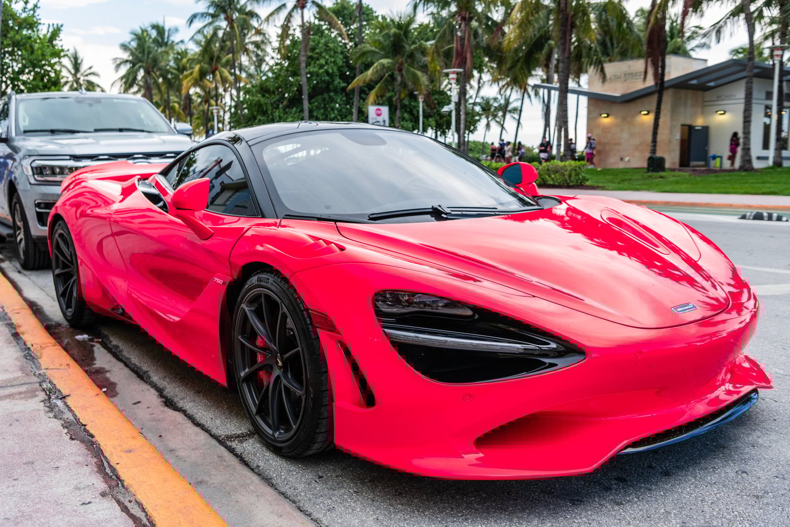 Miami Beach, Florida USA - June 8, 2024: 2019 McLaren 720S Performance at miami beach. Orange 2019 McLaren 720S Performance