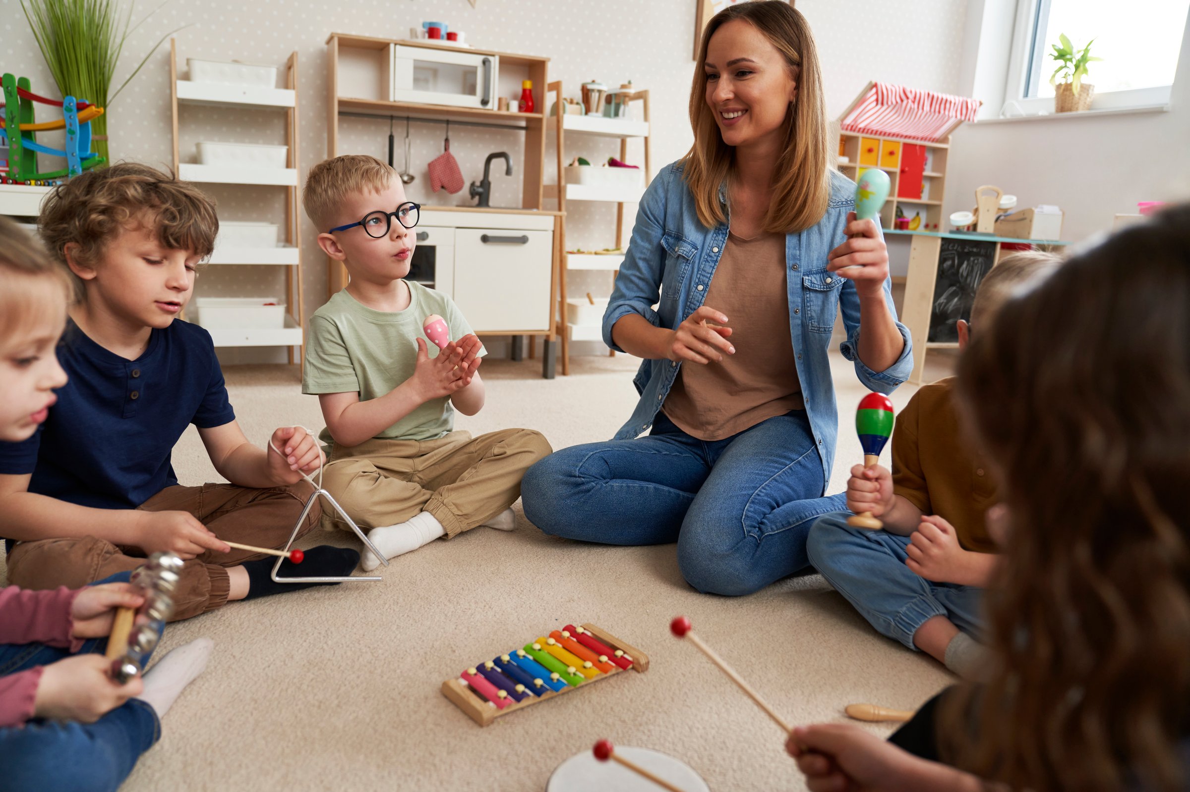 Children having music classes with music instruments