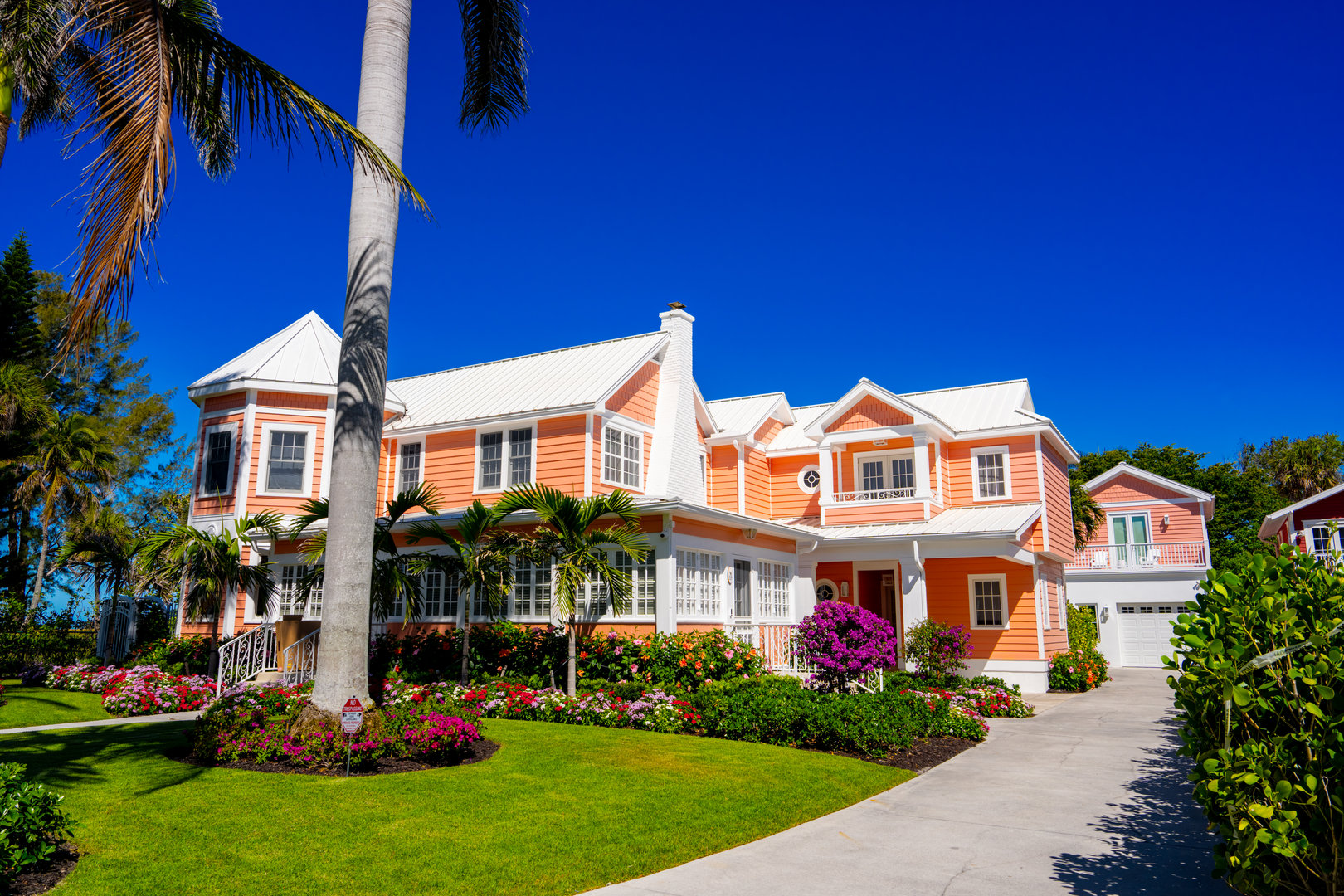 Naples, FL, USA - March 19, 2025: Pink beach house in Naples Florida
