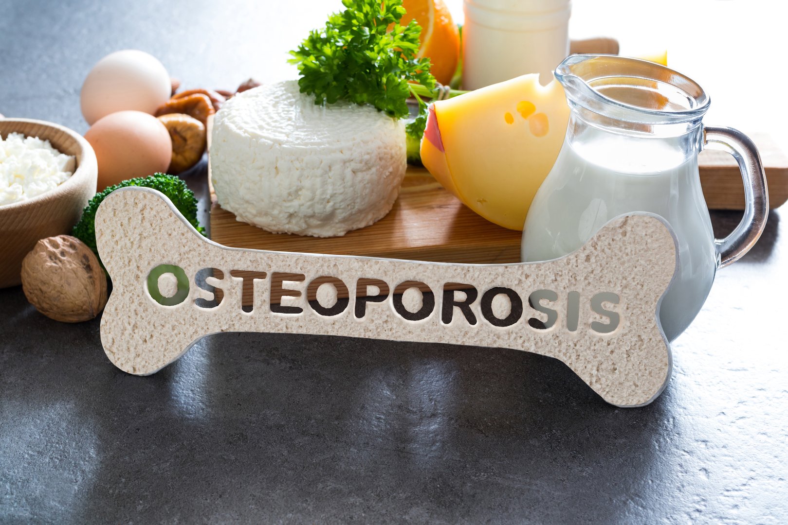 Osteoporosis concept. Food products recommended for osteoporosis, diary and non-diary products rich in calcium.