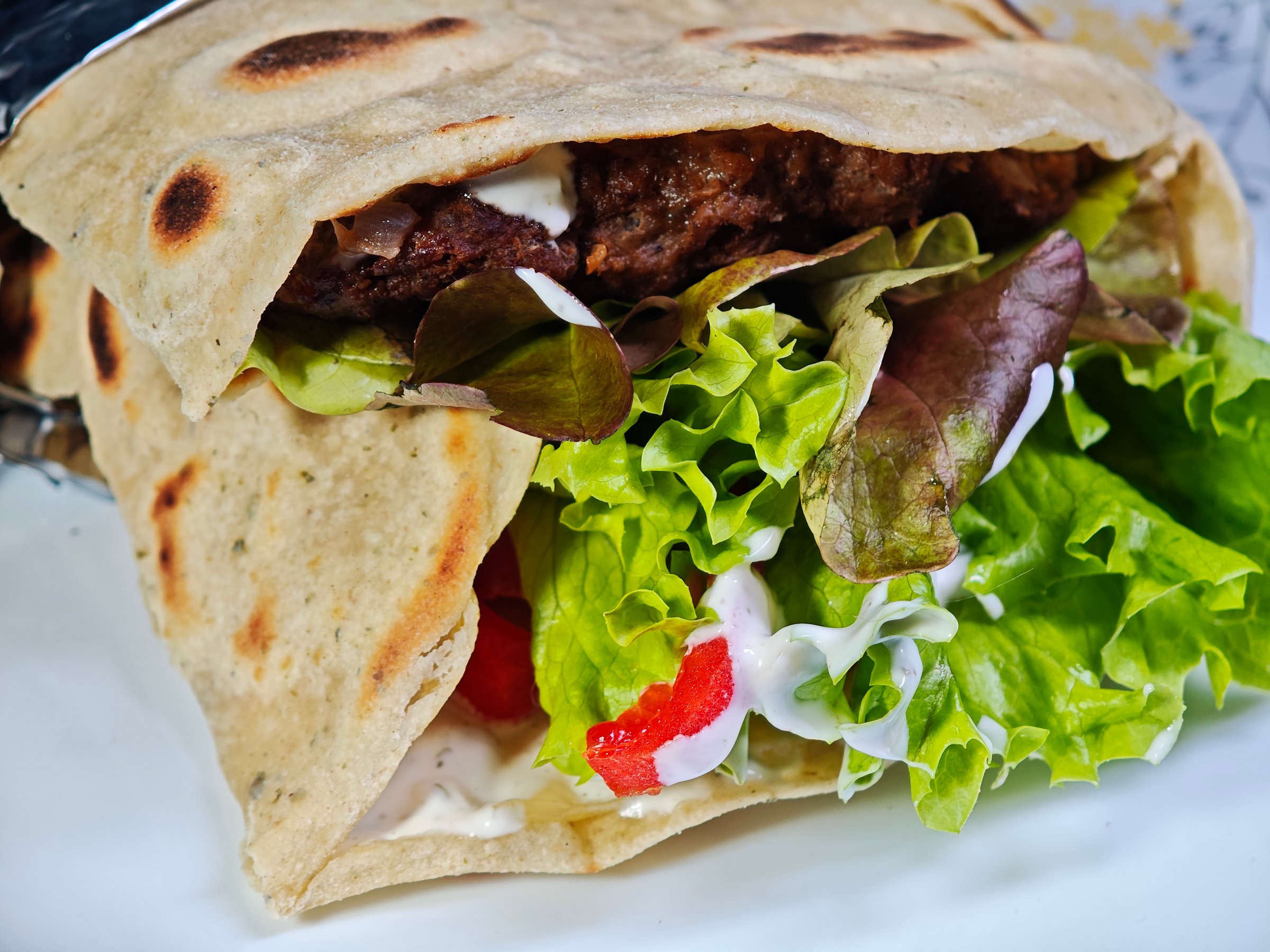 Tortilla with vegetables and meat macro kebab