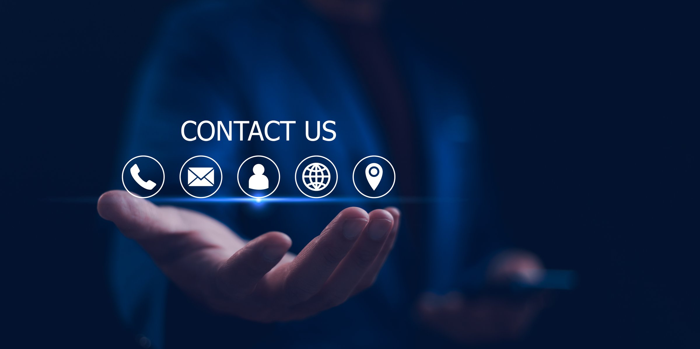 Contact us or Customer support hotline, Businessman touching on virtual screen contact icons (email, address, live chat, telephone). Customer service, helpdesk advice online support people connect.