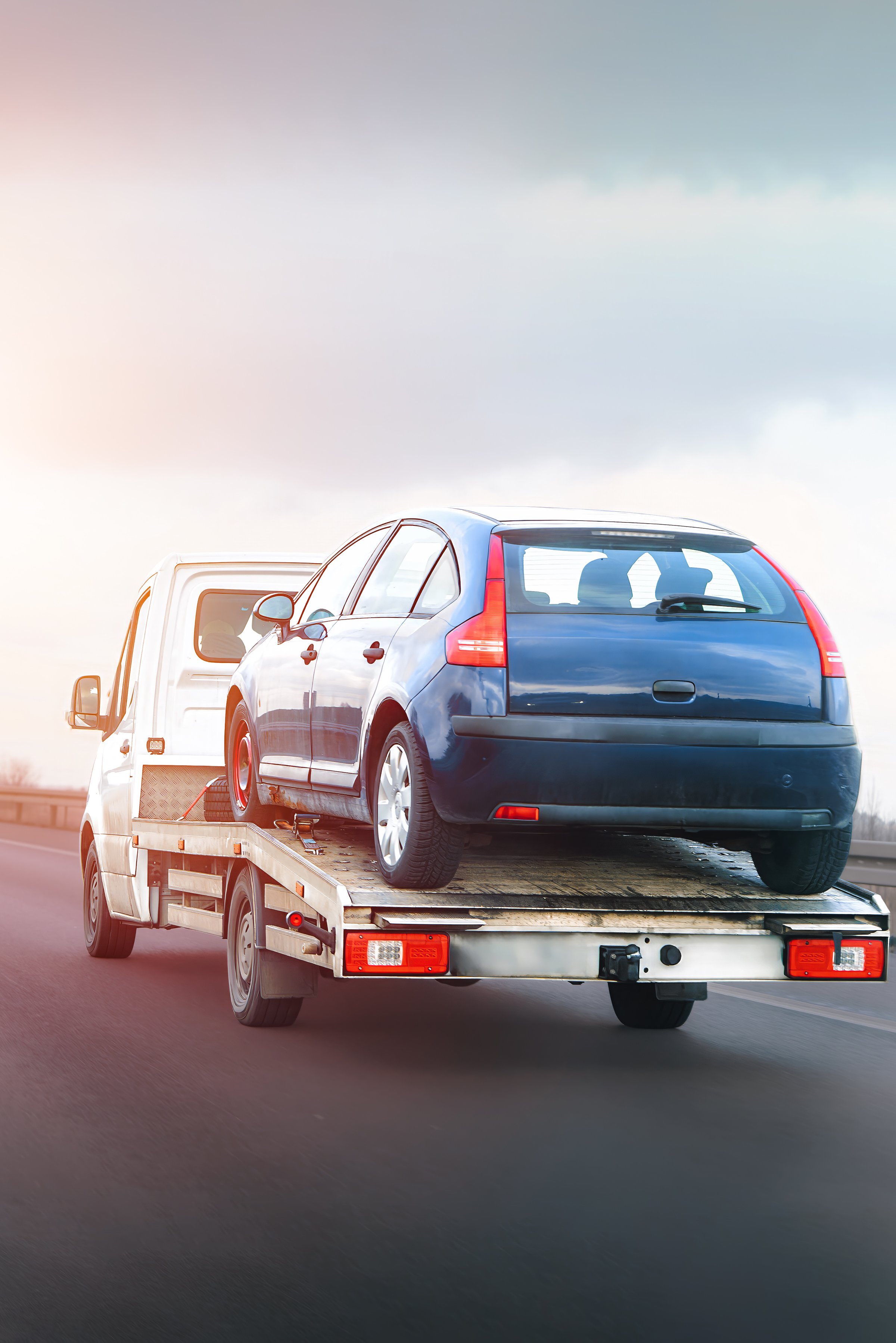 Vehicle loaded on roadside recovery truck