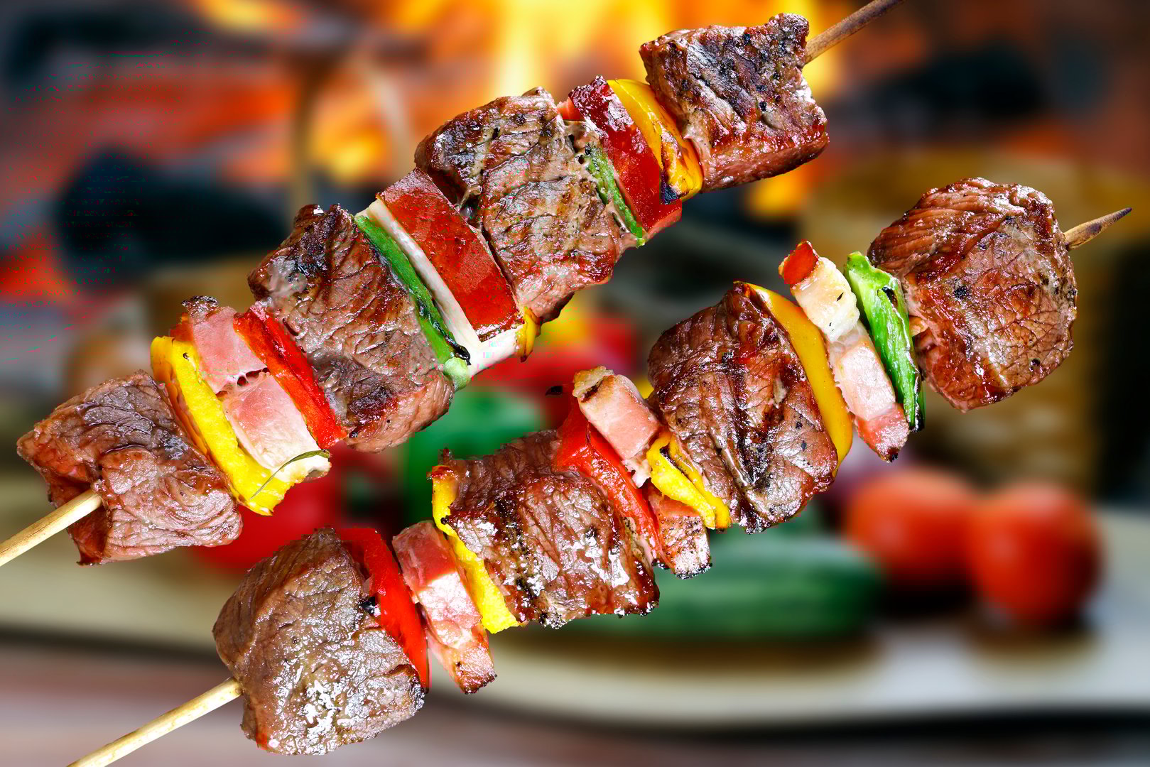 Meat skewer with bacon and vegetables