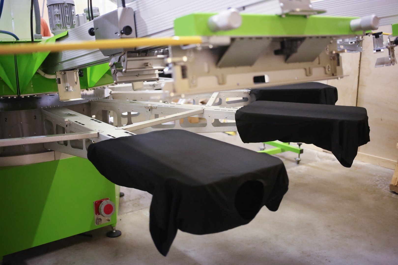 Screen printer loaded with shirts