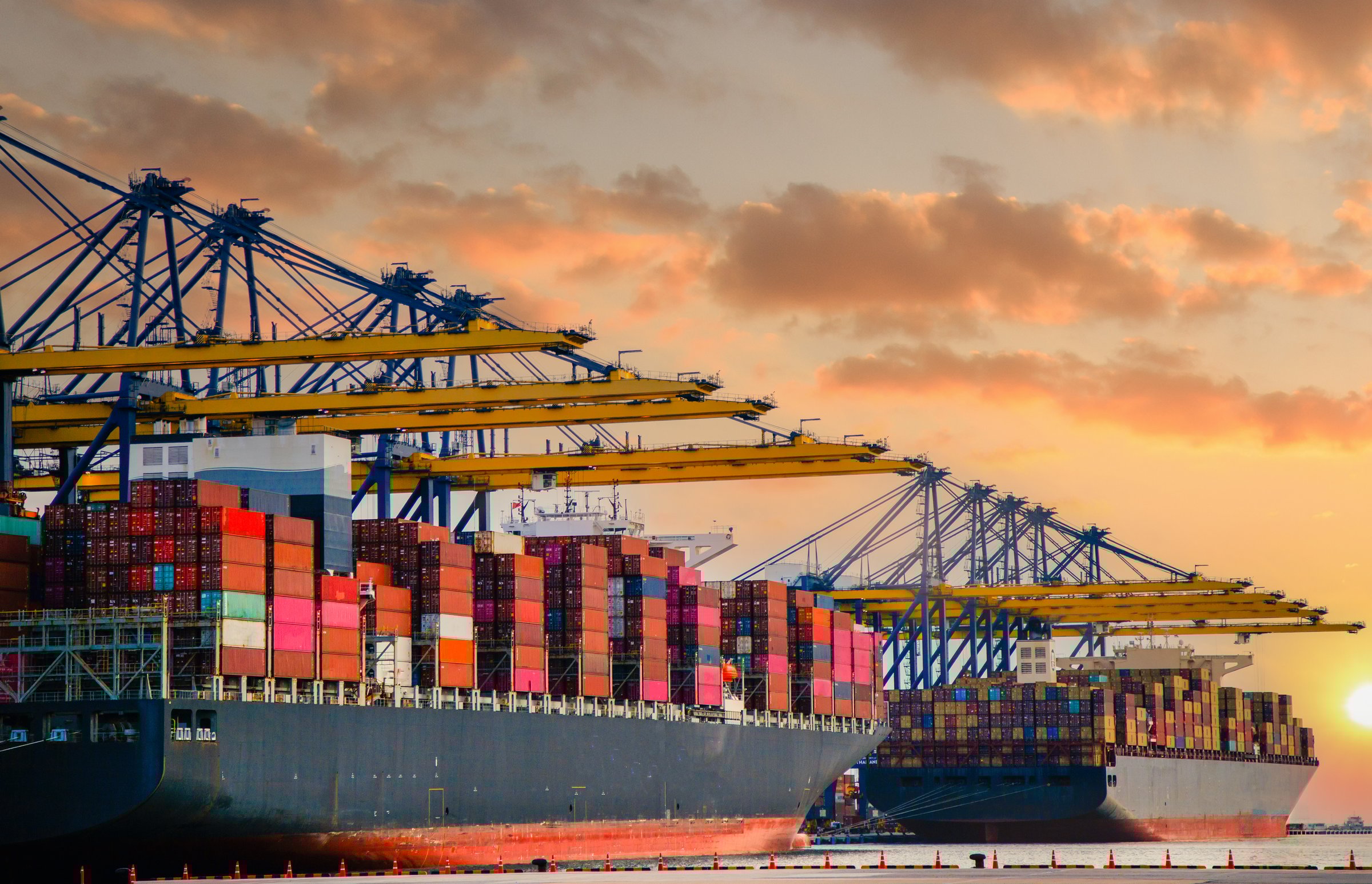 Close up vehicle carrier vessel loading car for shipping to worldwide, Large RoRo (Roll on off) vehicle car carrier, New car lined up in the port for import export around the world.