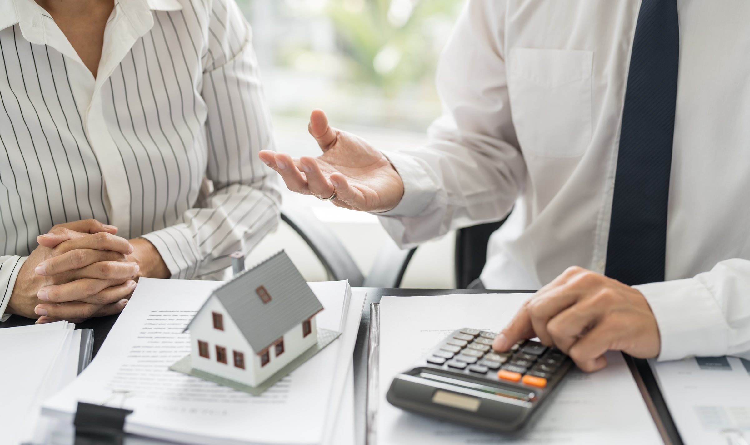 Business people signing contract making deal with real estate agent Concept for consultant home insurance Real estate investment Property insurance security. Real estate agent.