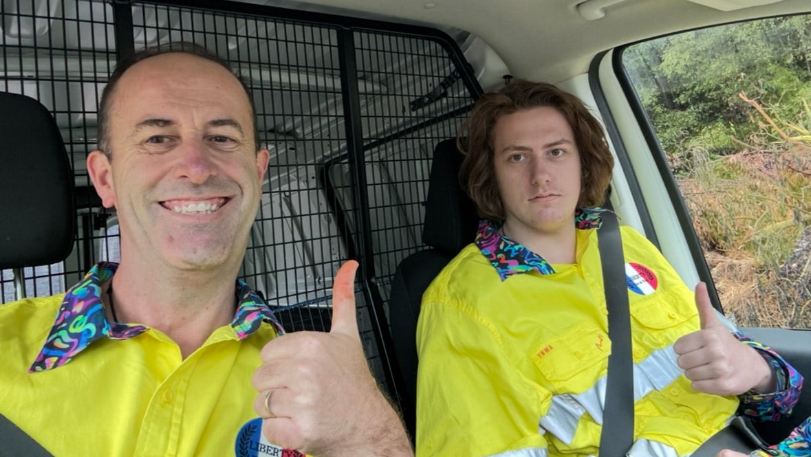 Liberty Test & Tag technicians wearing bright yellow TradeMutt workwear shirts, supporting mental health awareness in the trades