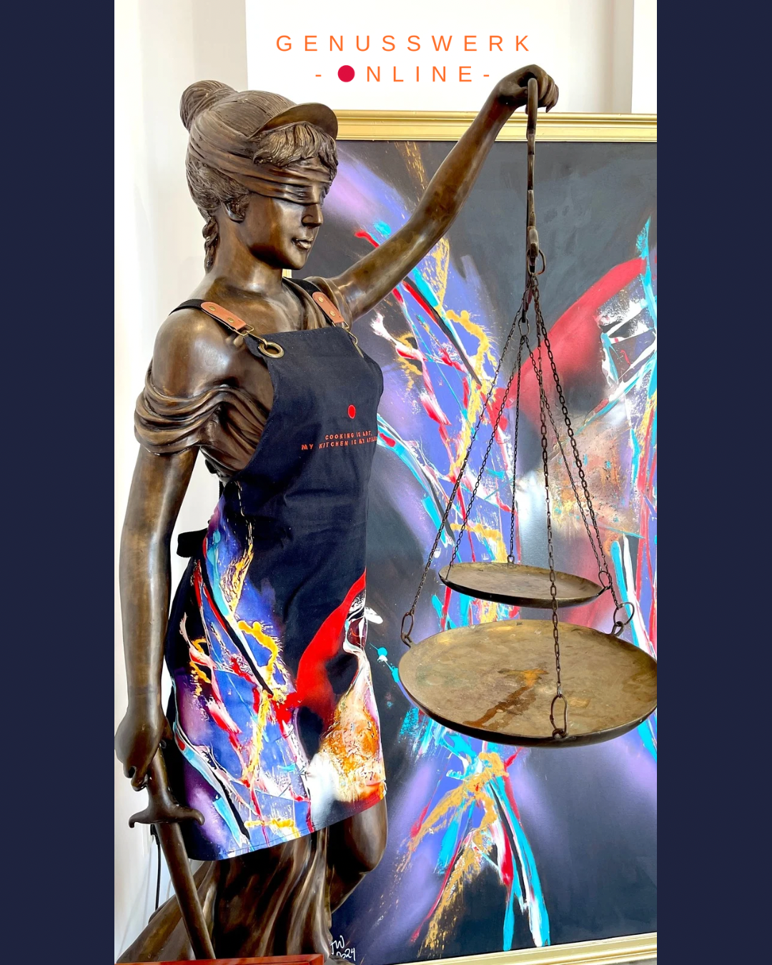 Bronze statue of Lady Justice wearing a colorful apron, holding scales, in front of an abstract painting.