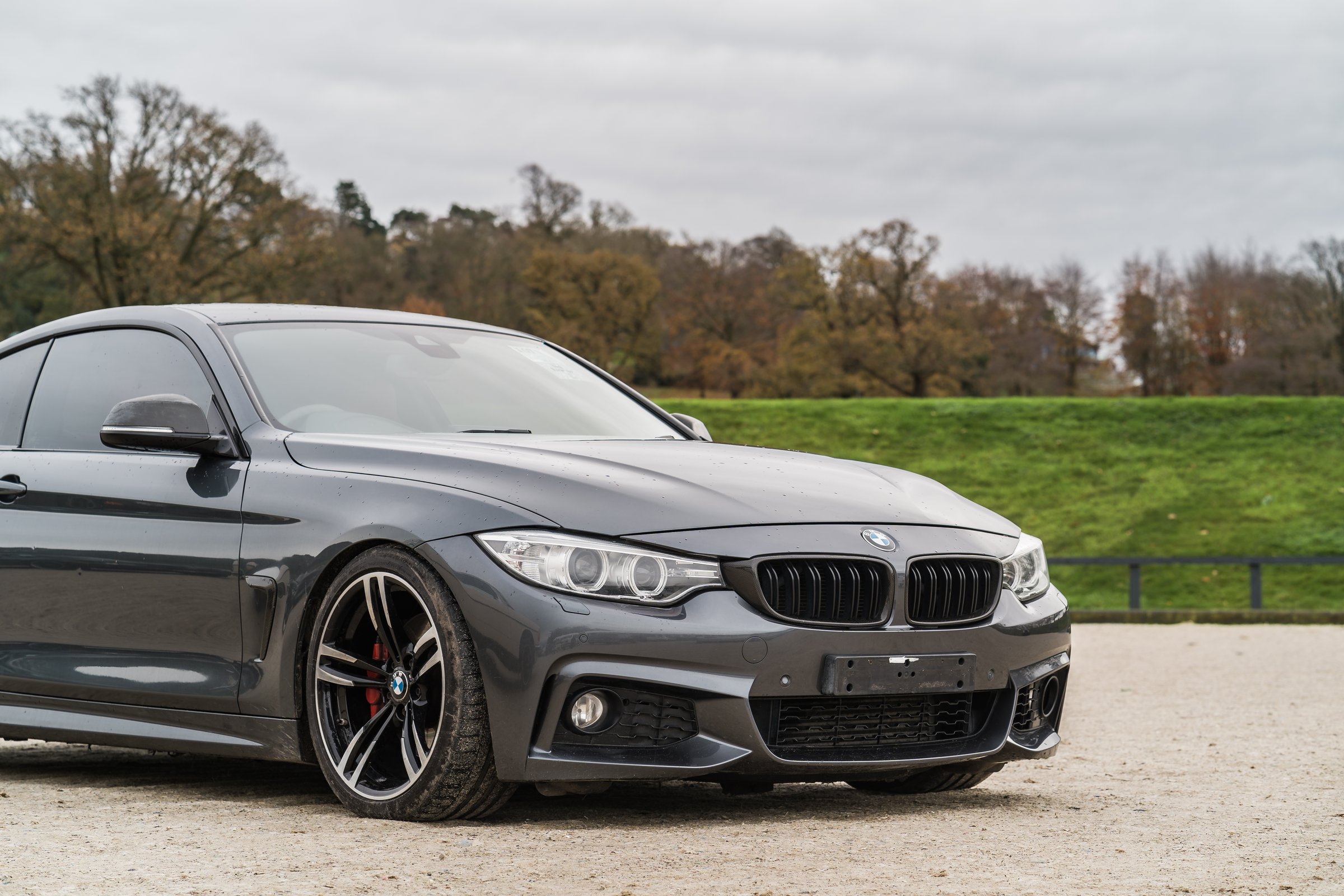 Chester, Cheshire, England, November 24th 2024. A gray BMW 4 Series is displayed at the Chester Car Auction.