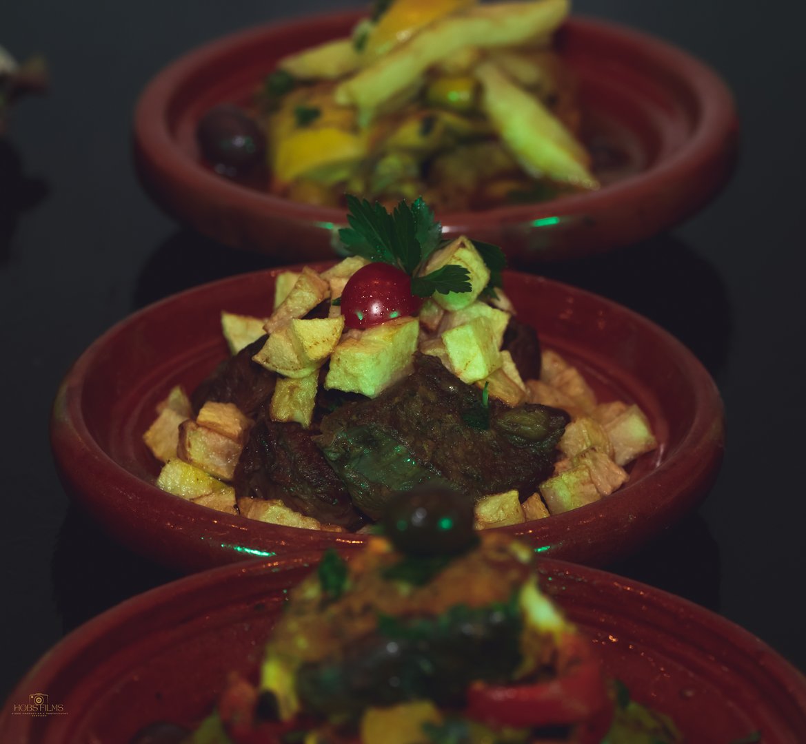 Morrocan cuisine chicken tajine and salads