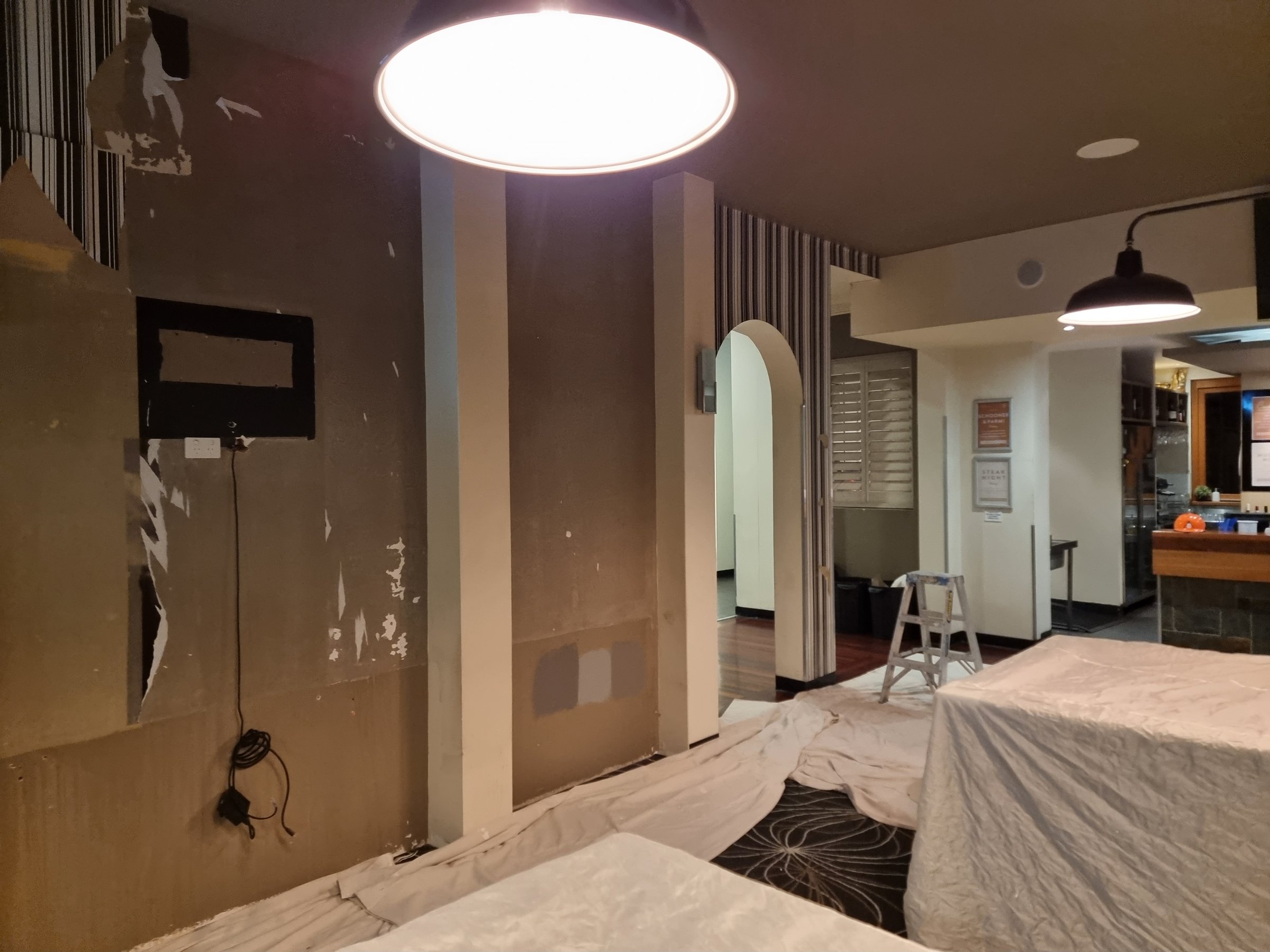 Professional wallpaper removal work in progress at Lorne Hotel project