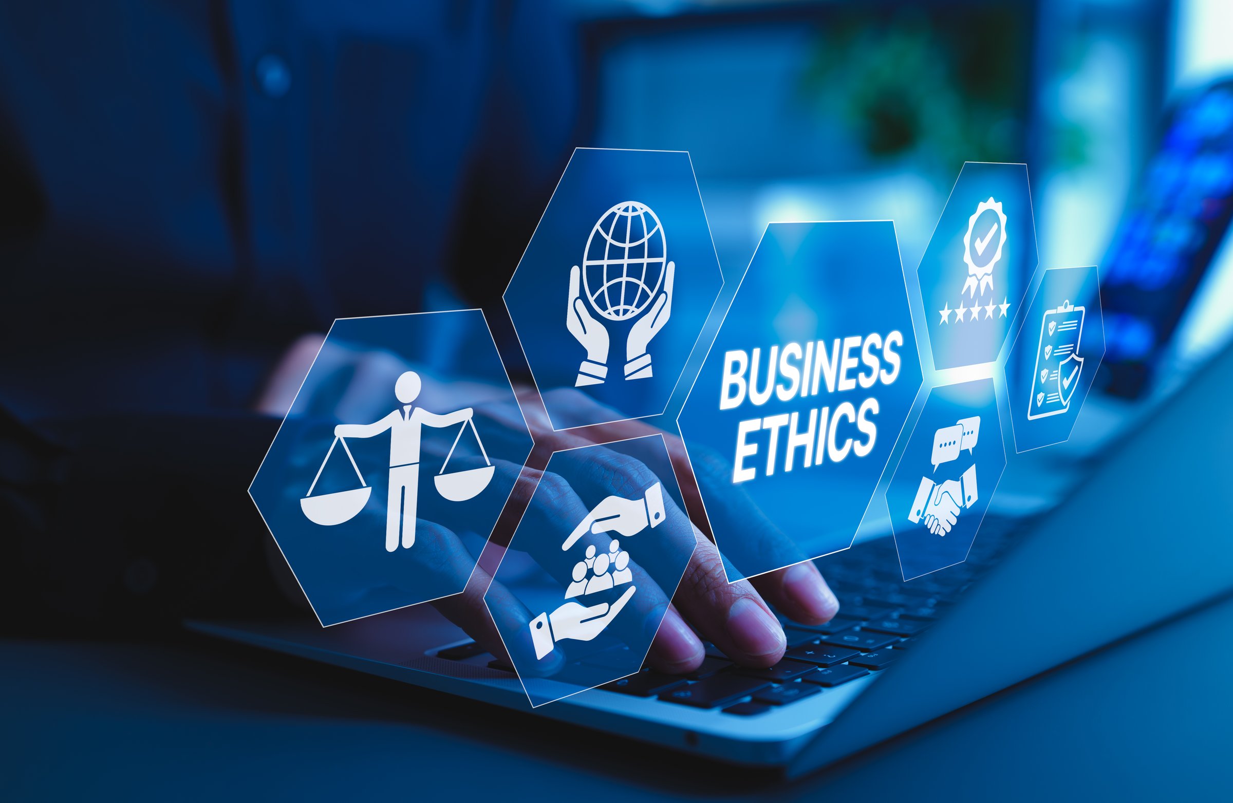 Business Ethics and Corporate Responsibility Concept. A businessman working on laptop with icons representing business ethics, integrity, corporate responsibility, professional standards, core values,