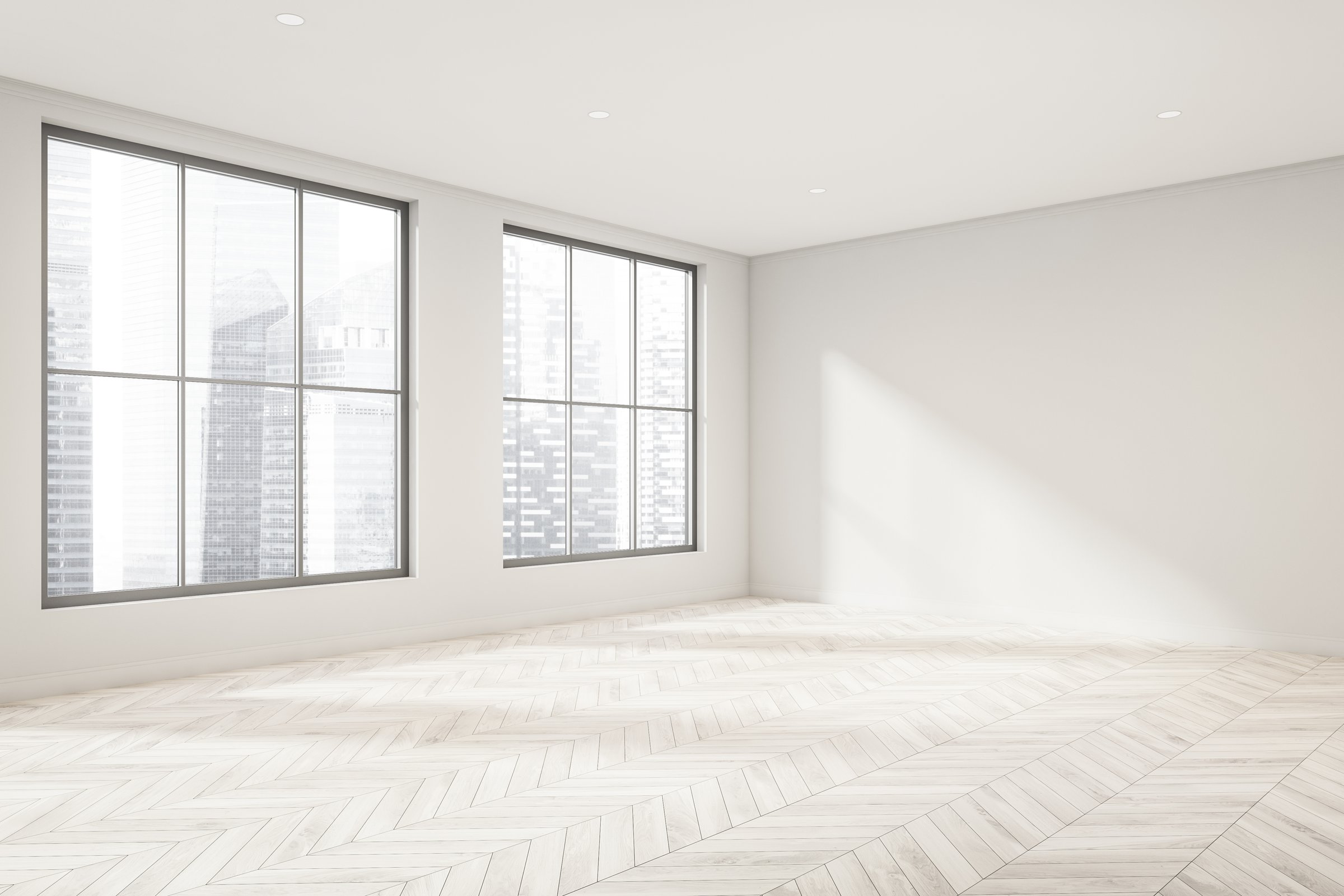 Empty modern Miami apartment with wood parquet floors ready for move-in