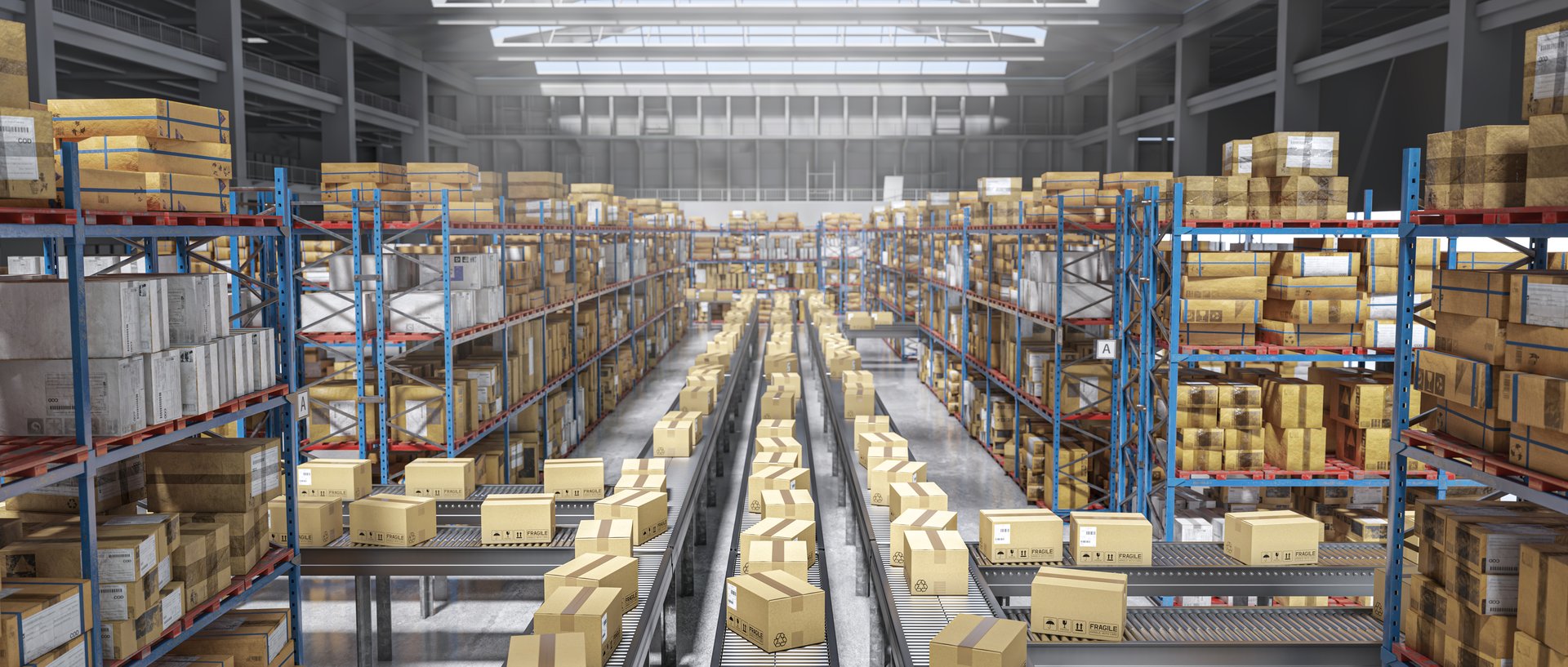 Cardboard boxes moving on conveyor belt in a distribution warehouse