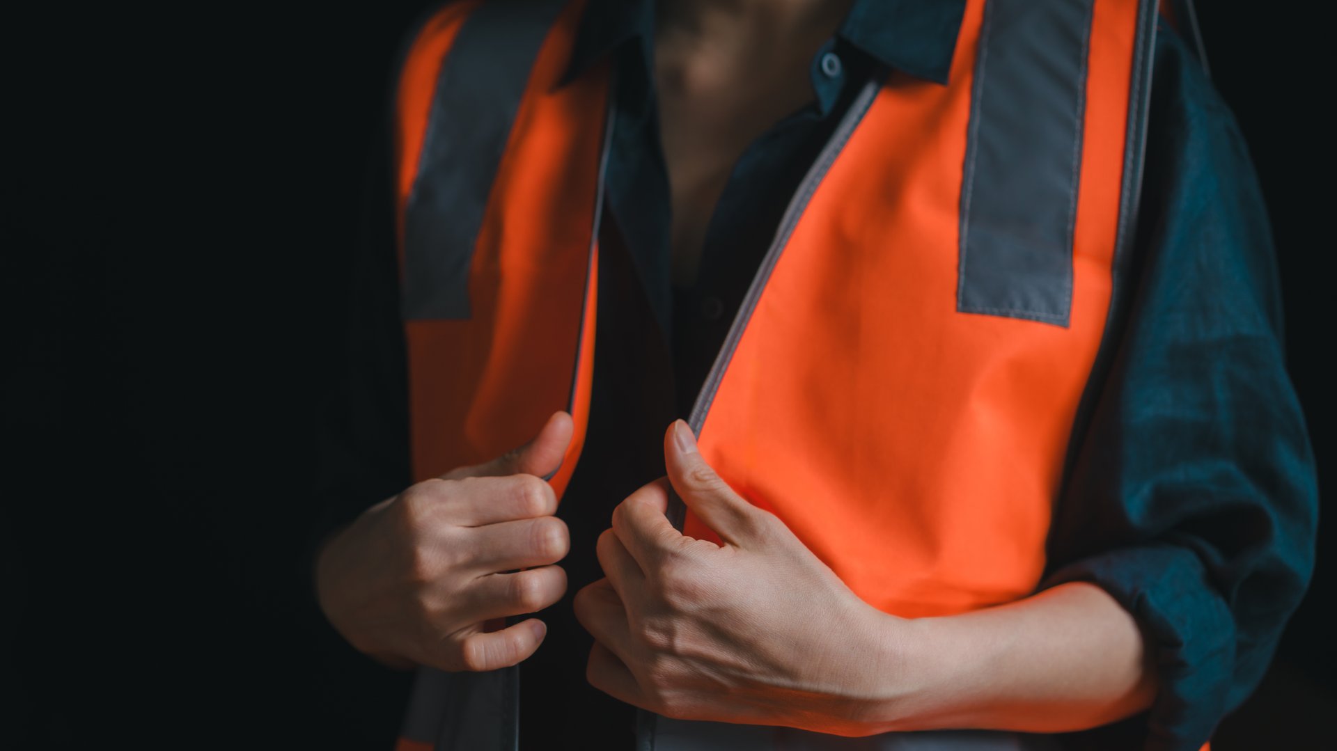 Worker wearing safety vest