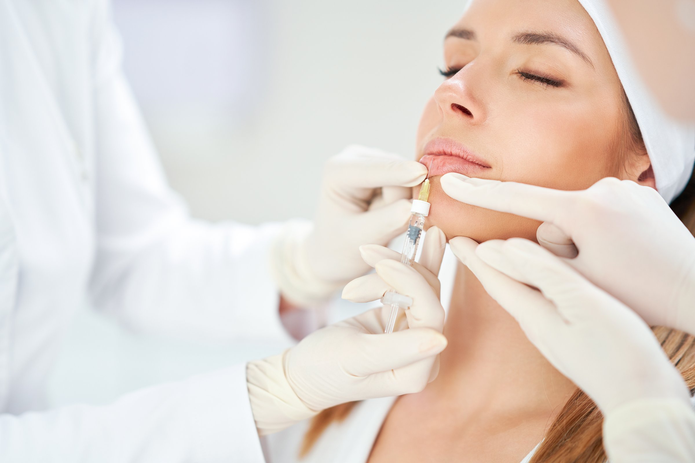 A scene of medical cosmetology treatments botox injection. High quality photo