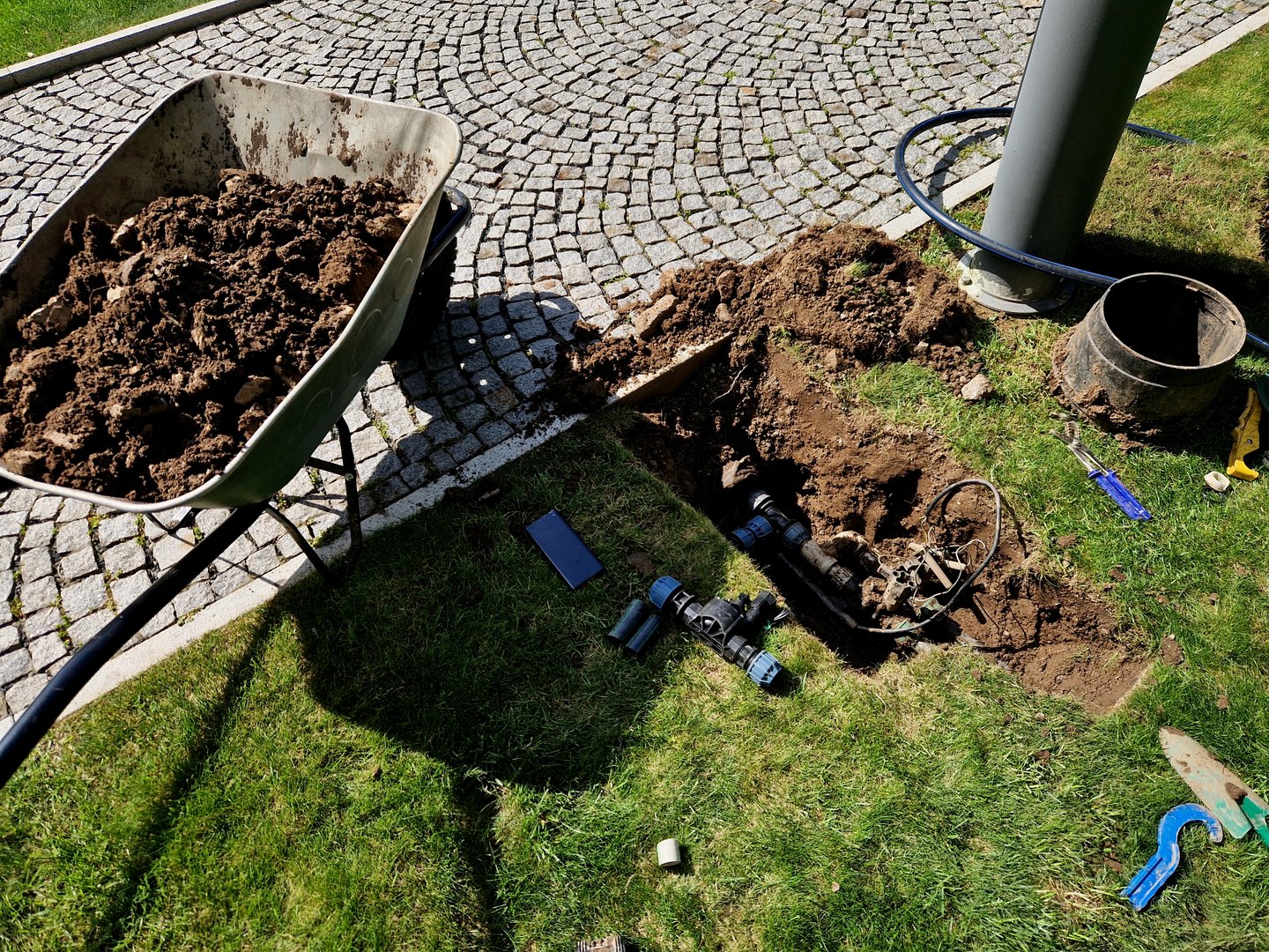 automatic irrigation installer's workplace. From the main shaft, the pipe is connected to the sprinklers. The solenoid valves are controlled by the main computer unit with wifi