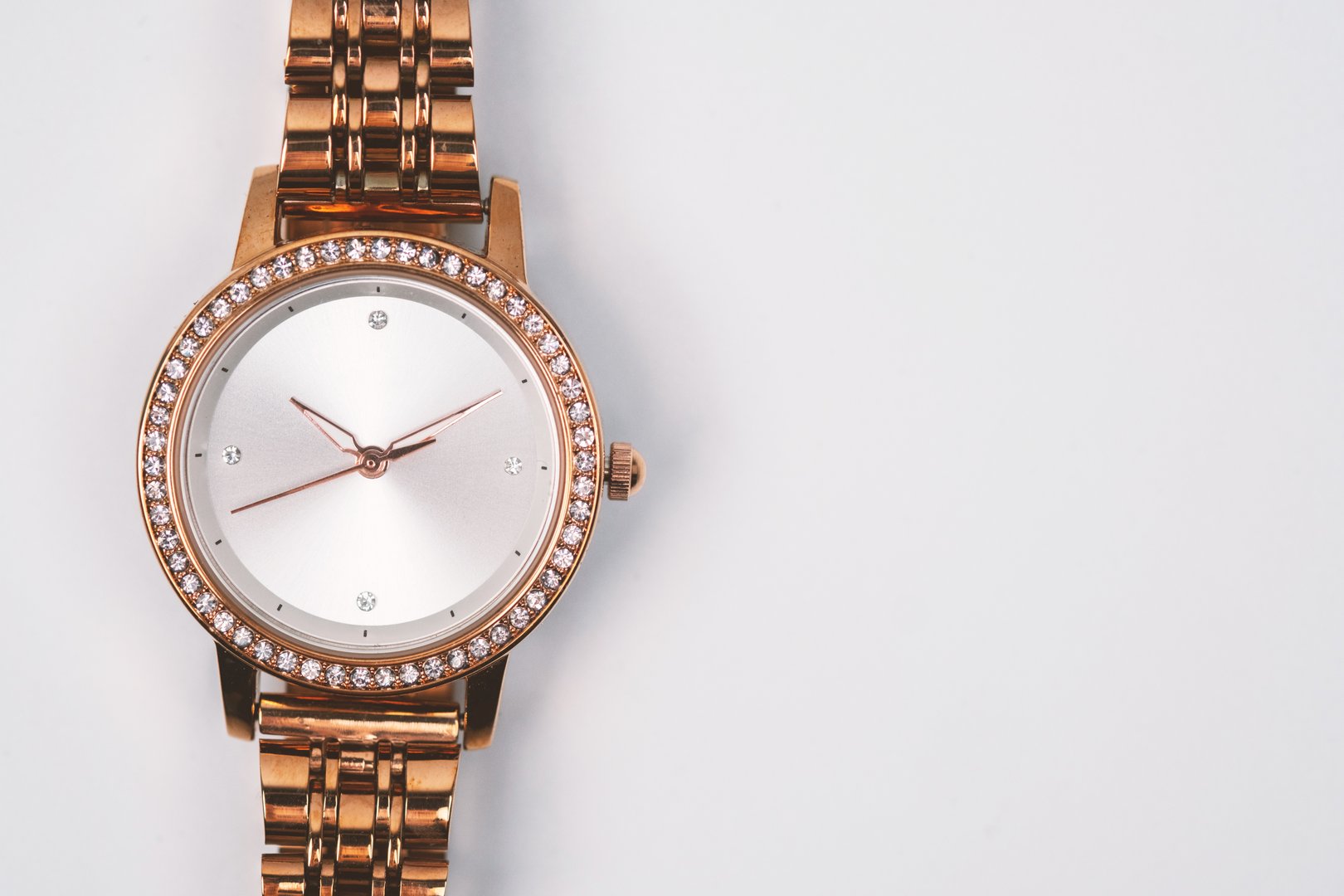 Elegant Rose Gold Wristwatch on a white background