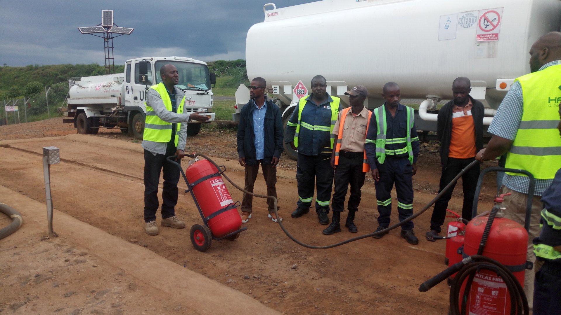 QHSE Zimbabwe professional safety training session with participants in safety gear
