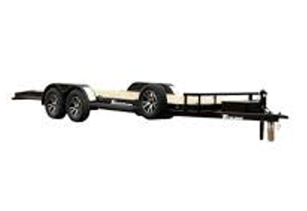 A flatbed trailer with dual axles, black frame, and wooden platform, designed for transporting vehicles or heavy loads.