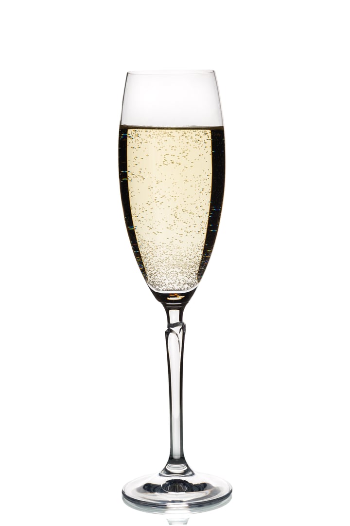 Glass of champagne isolated on white background