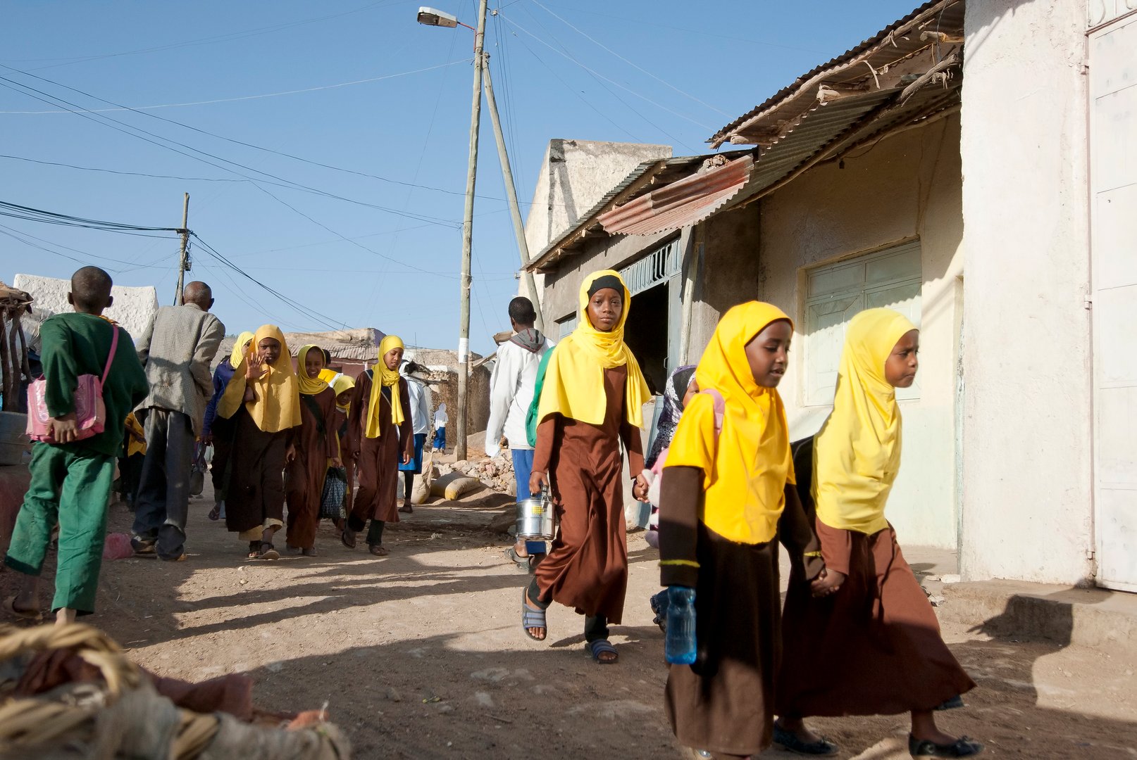 Harar, Ethiopia - March 28th, 2012: Unidentified Ethiopian girls walk to madrasa (Islamic school or college) in Harar, Ethiopia on March 28, 2012.