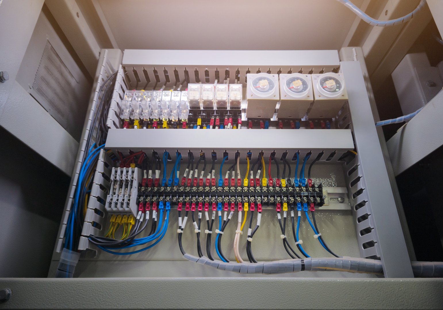 Electrical control panels with terminals connection and wire circuit control relays contactors.