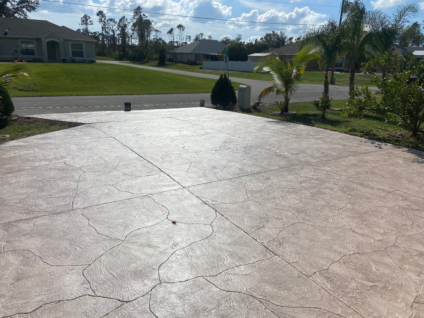 Hand texture scoreline stamped concrete driveway