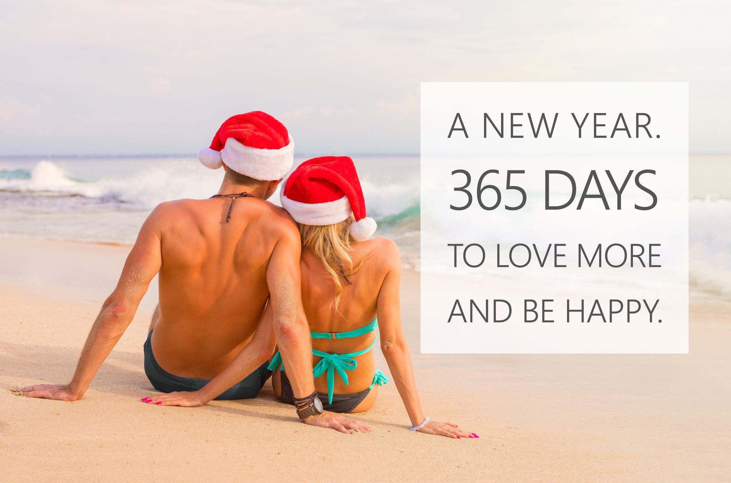 Unrecognizable couple enjoying vacation on Christmas holidays on a tropical beach. Inspirational New Years quote for couples