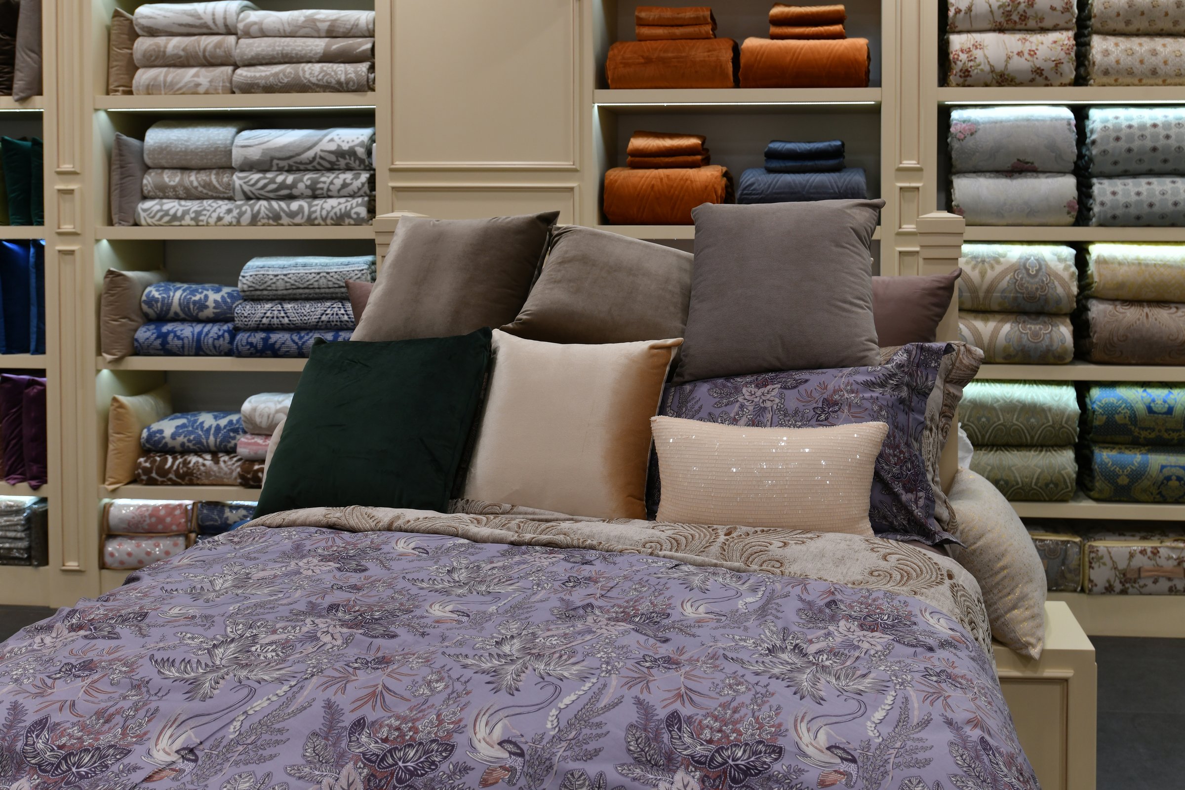 The Bed with pillows in the interior of the store