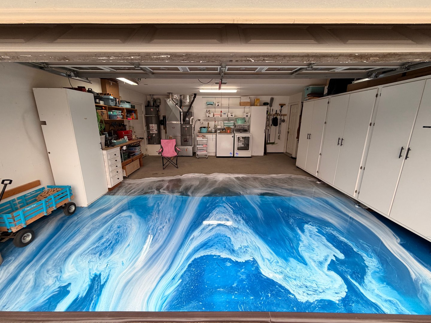 Beach themed metallic epoxy floor with stunning ocean-inspired design