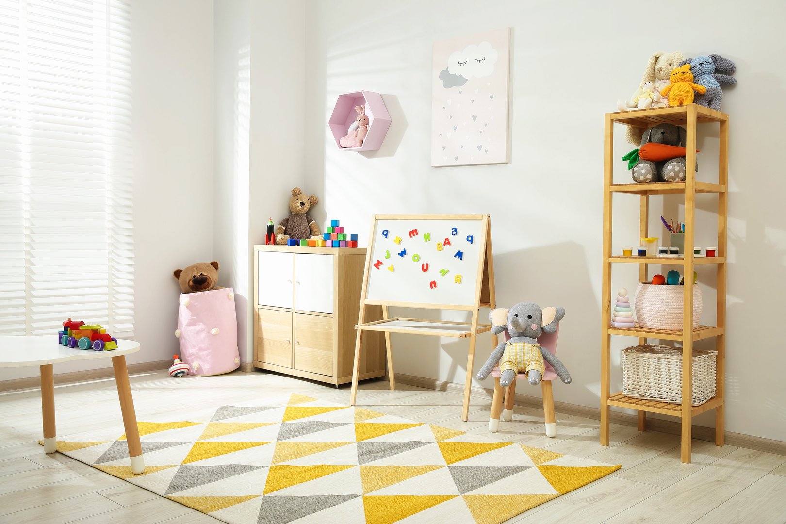 Beautiful child's room interior with toys and stylish furniture