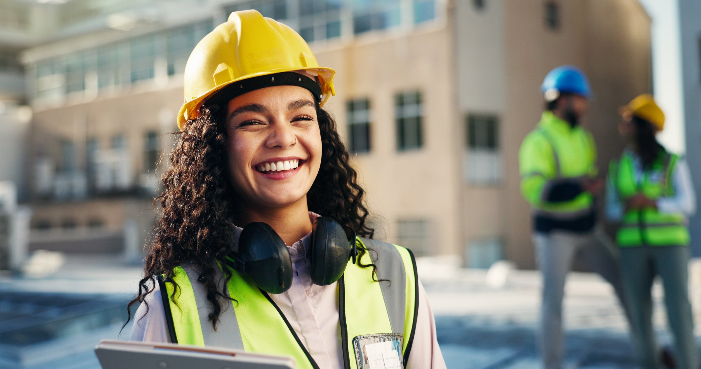 Portrait, laugh and contractor with woman on rooftop for building inspection, checklist or smile. Safety regulations, architecture report and clipboard with person on construction site as engineer