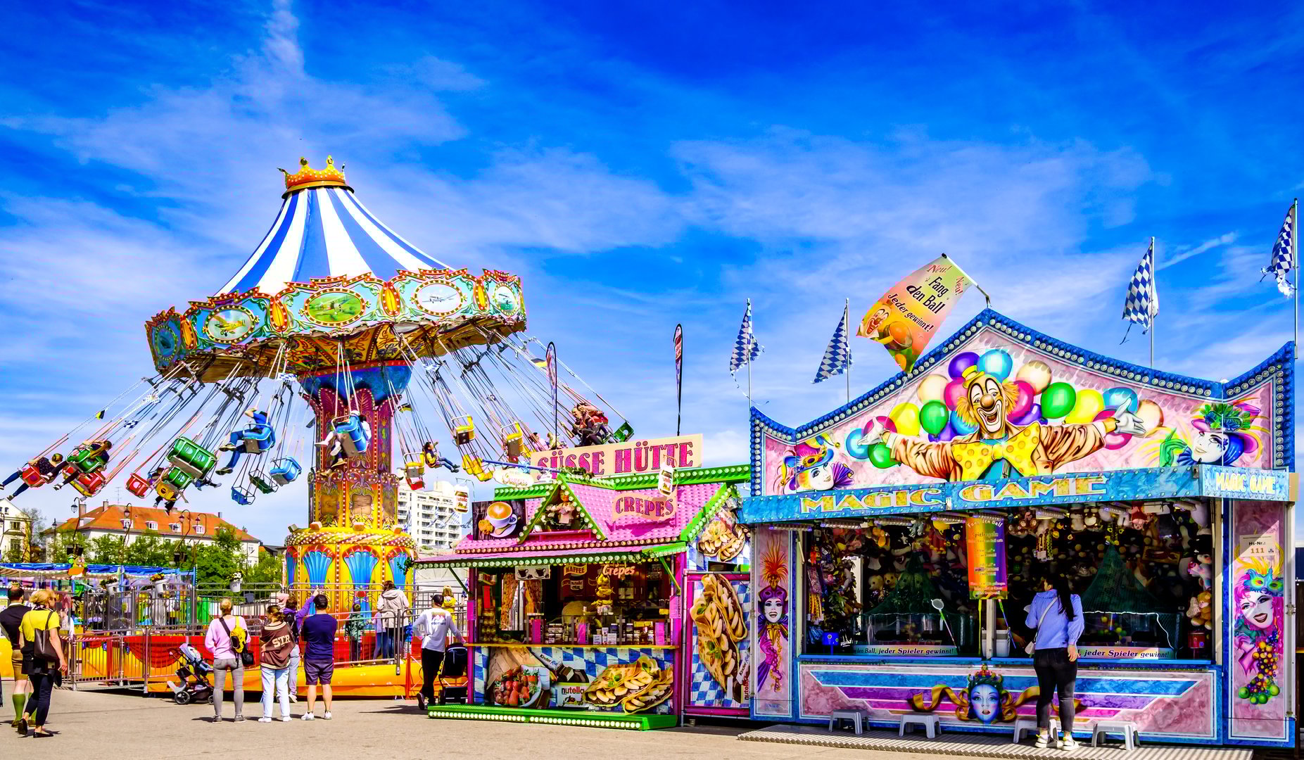 Munich, Germany - May 7: typical chain carousel and decoration at the annual spring festival (Frühlingsfest) in Munich on May 7, 2023