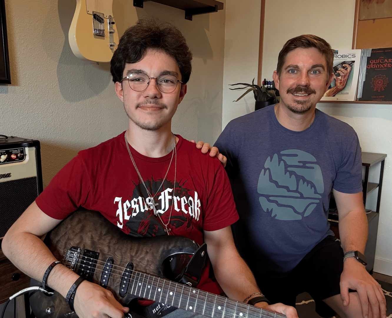 Teaching guitar student