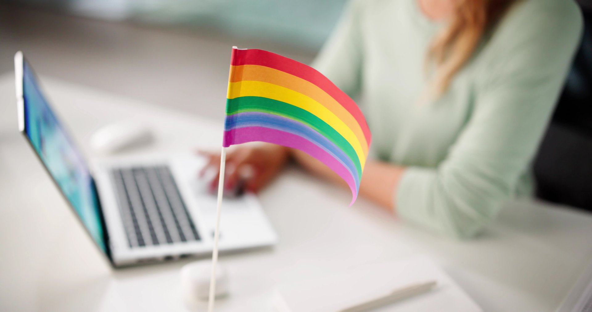 Diverse Workplace with Rainbow Flag
