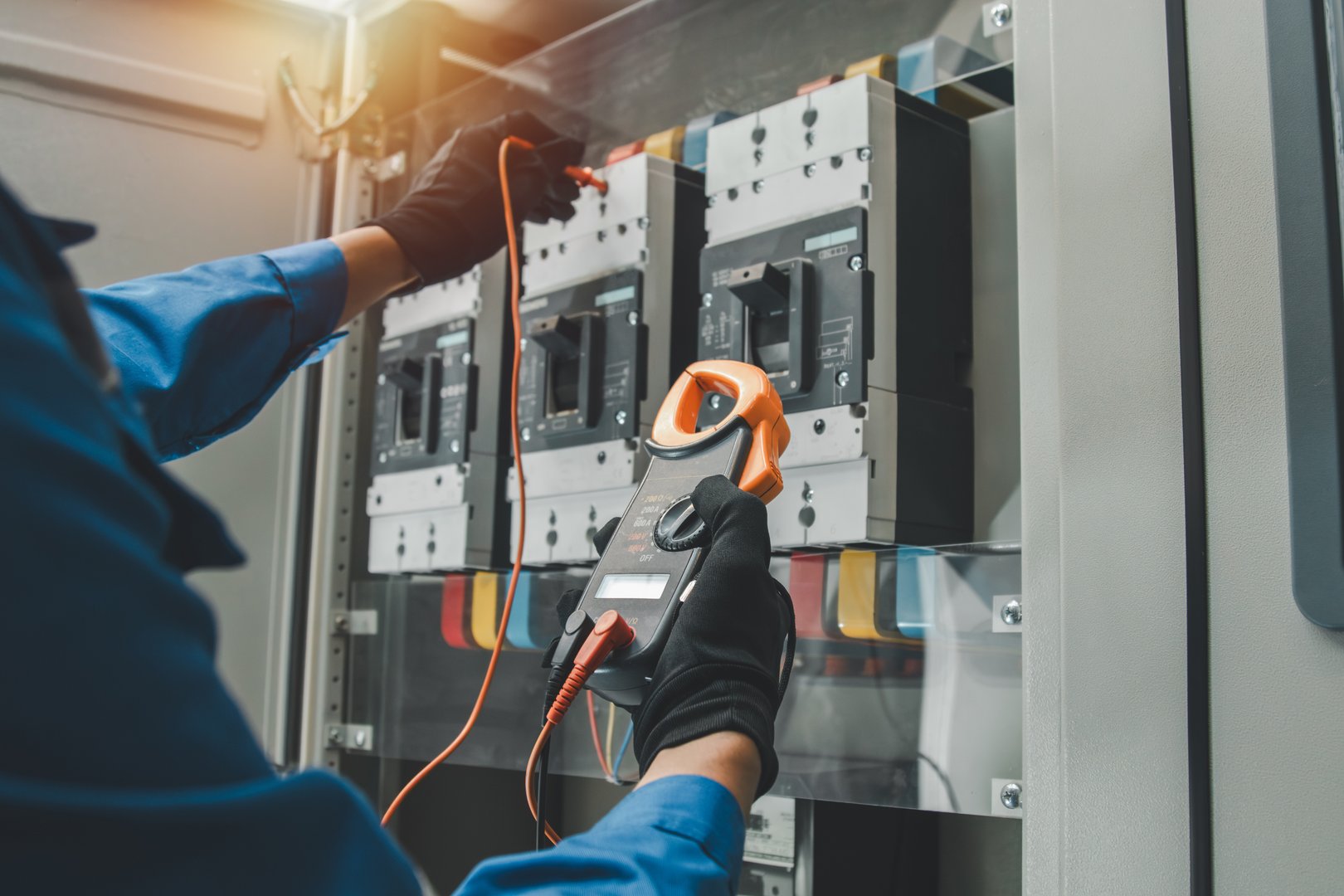 Electrical equipment maintenance service engineer Engineers carry AC voltmeters to check voltage at breaker terminals and inspect switchgear.