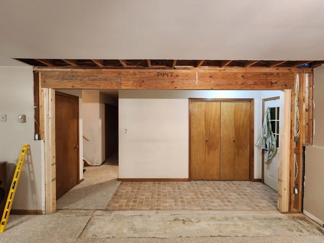 Open concept living space created by professional wall removal