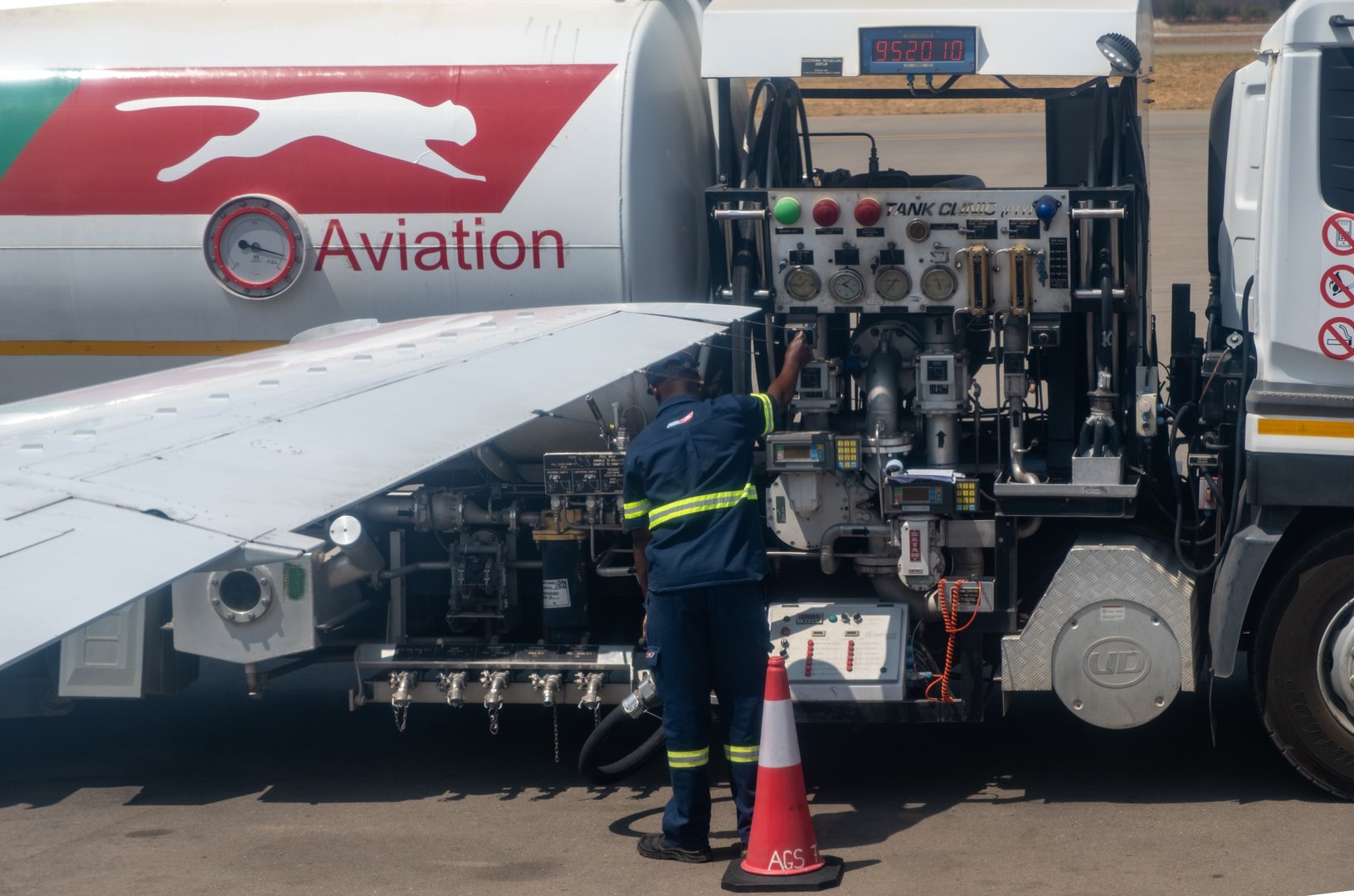 October 20, 2024. Zimbabwe, Victoria falls airport  Aircraft refuel, maintenance. Fuel tank truck and staff