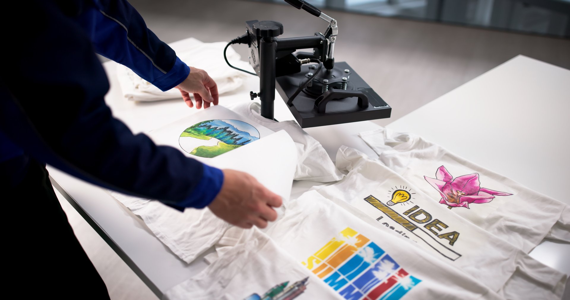 Young Latino Man Begins Custom T-shirt Design Business With Heat Press Machine.