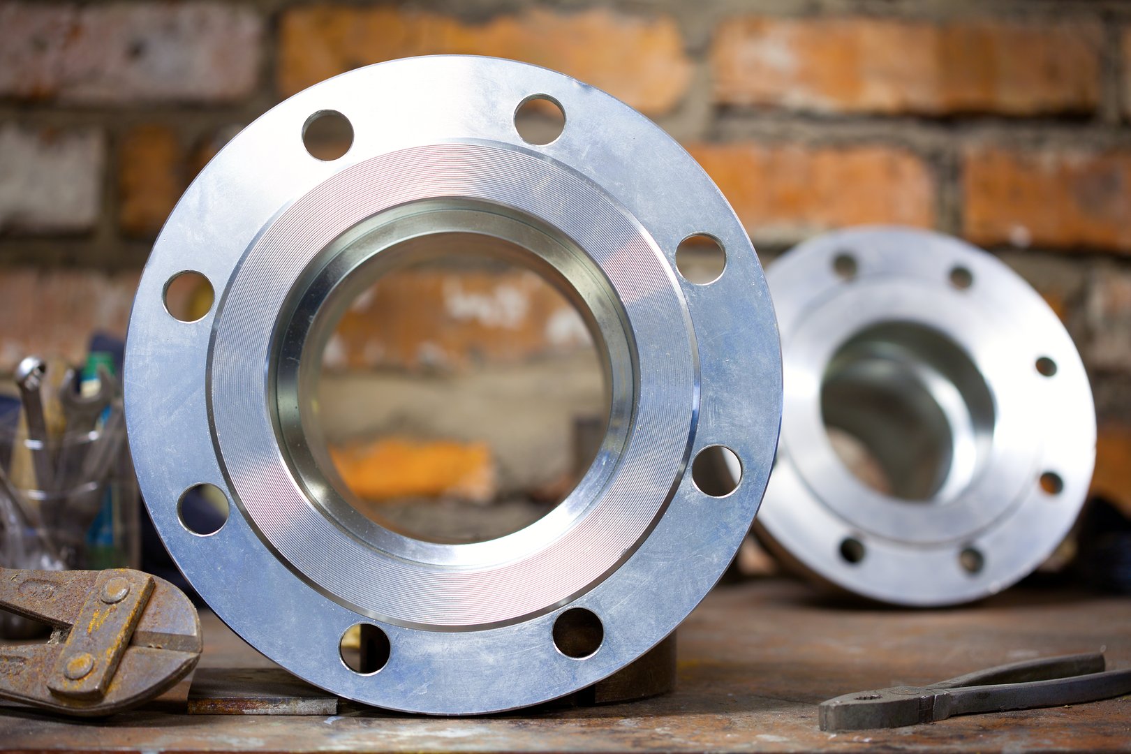 Steel flanges for industrial hoses
